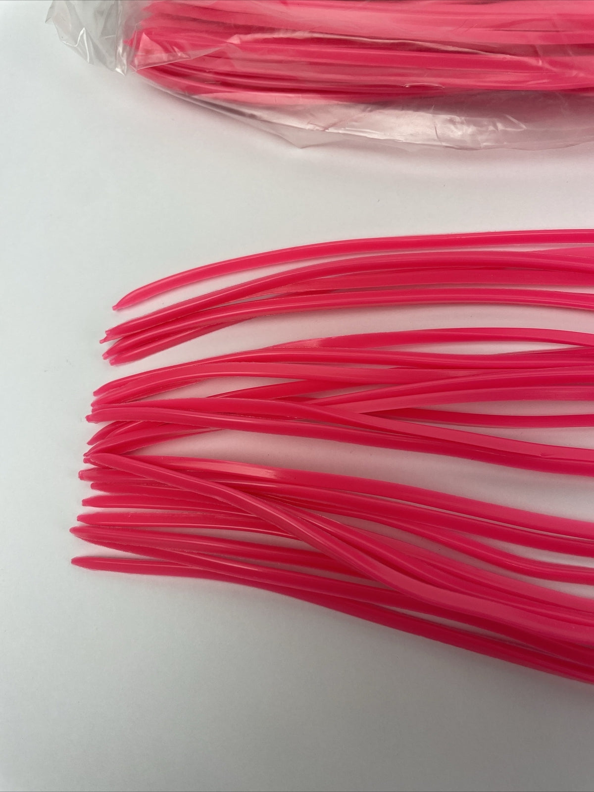 Newell MFG pink offshore trolling fishing skirts 10 pack for tuna and marlin lures.