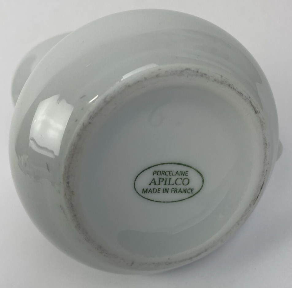 Apilco France Café de Flore 3-inch white porcelain cream pitcher.