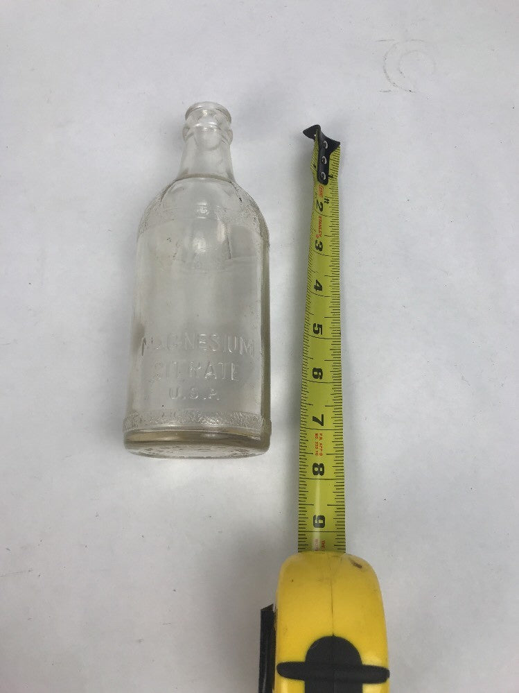 Vintage magnesium sulphate clear glass bottle embossed Registered Not To Be Refilled.