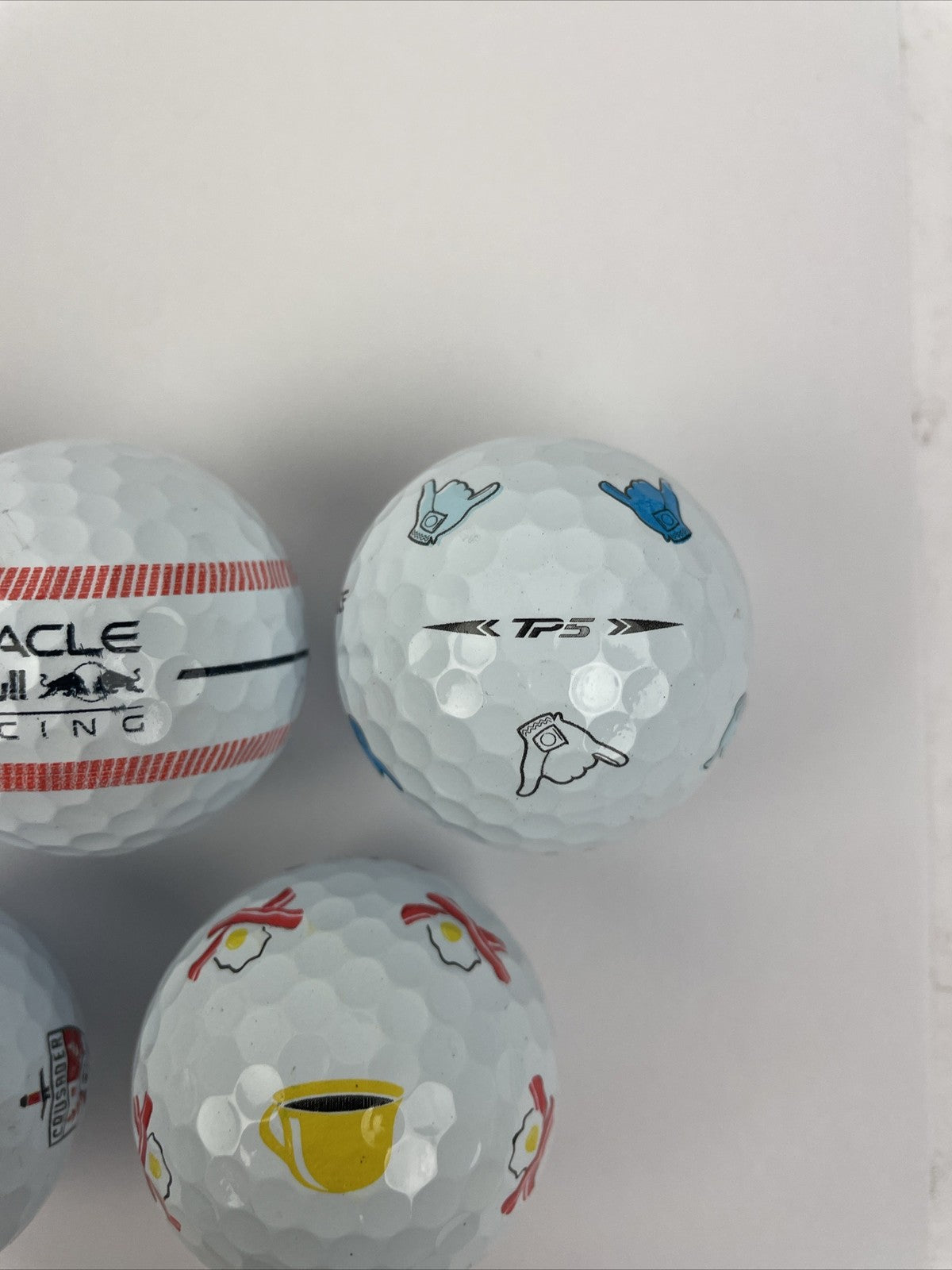 7 Taylormade TP5x Oracle Redbull SHAKA PEACH Bacon And Eggs Palm Shark Golf Ball