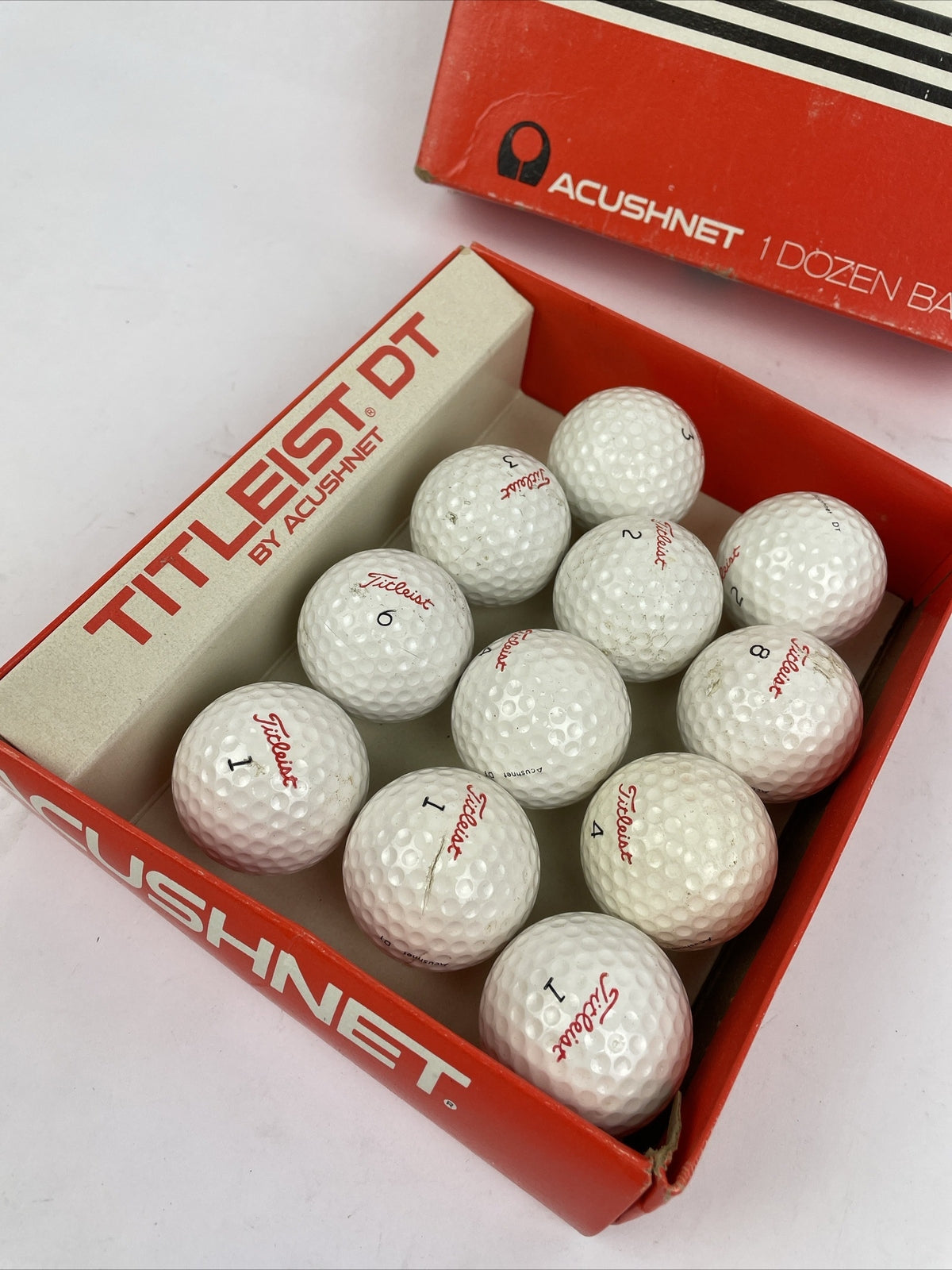 Rare vintage Titleist Acushnet DT golf balls set of 11 with original box numbered collectible golf memorabilia display item
