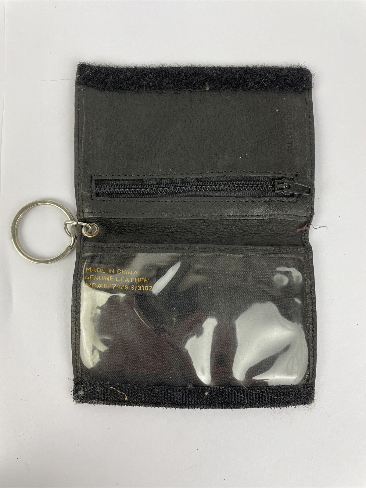 Cabela's Advanced Anglers green waist pack with extras for fly fishing and hiking.