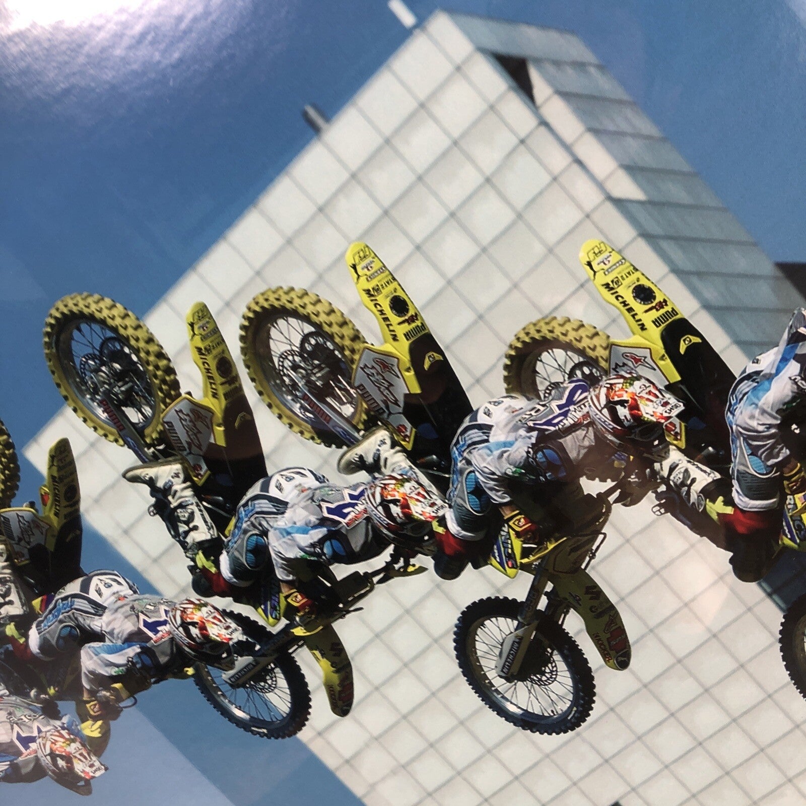 Travis Pastrana signed framed No Fear backflip poster measuring 42.5 by 30.5 inches.