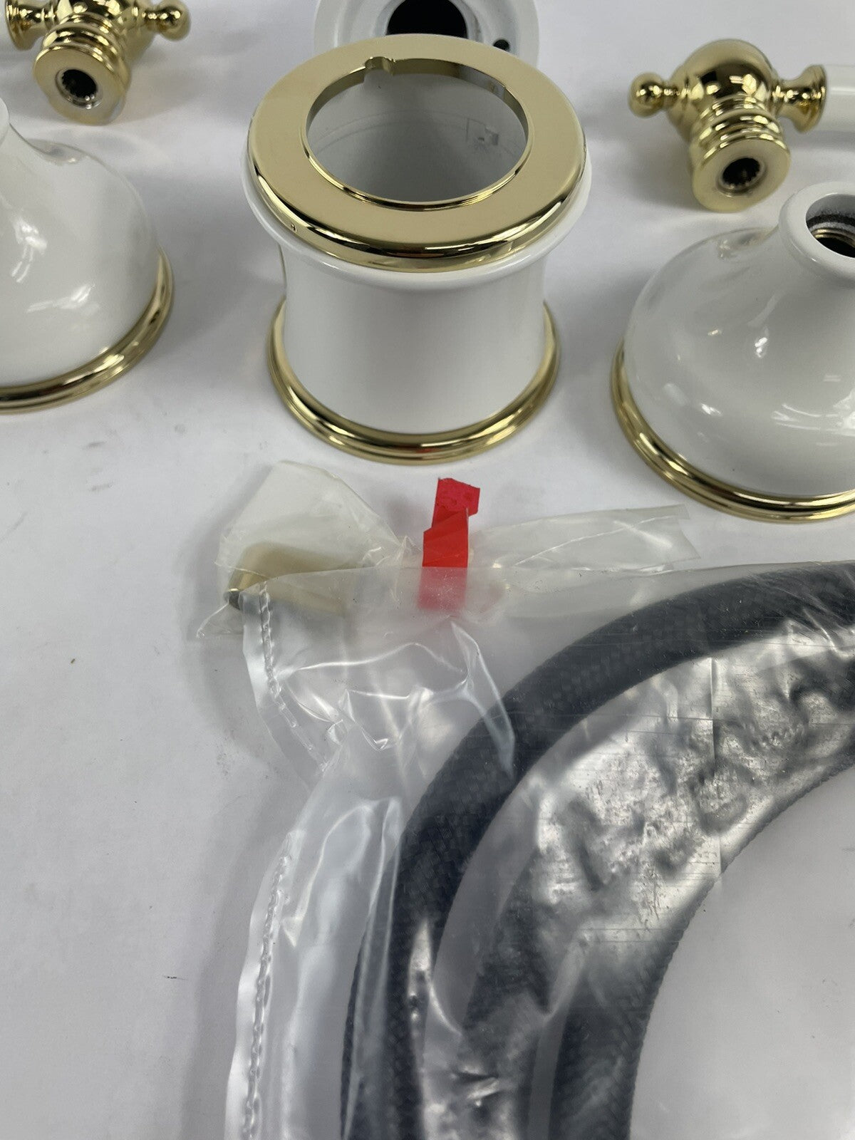 Rubinet Roman tub faucet trim set gold and white with hand shower T5HRBRJLWHBB