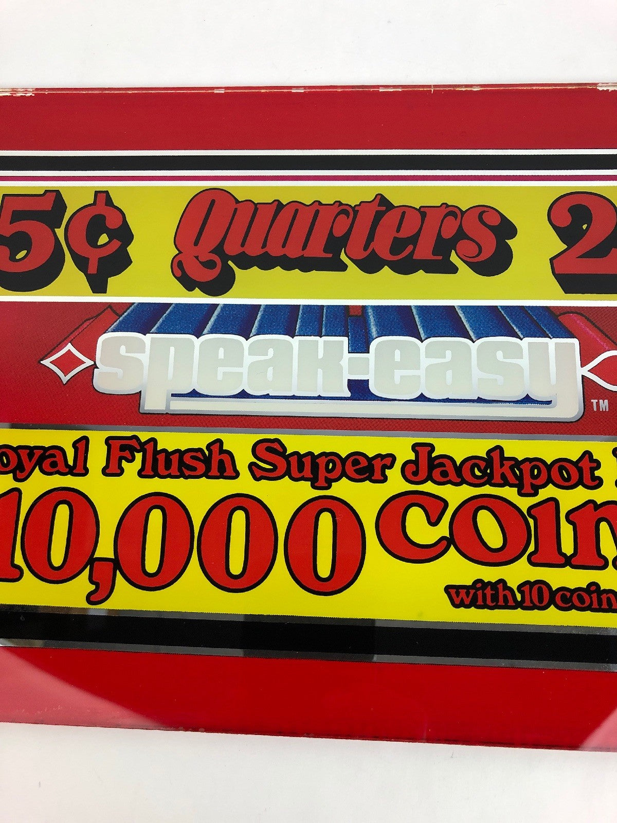 Vintage 1982 Speakeasy casino slot machine payout printed glass panel.