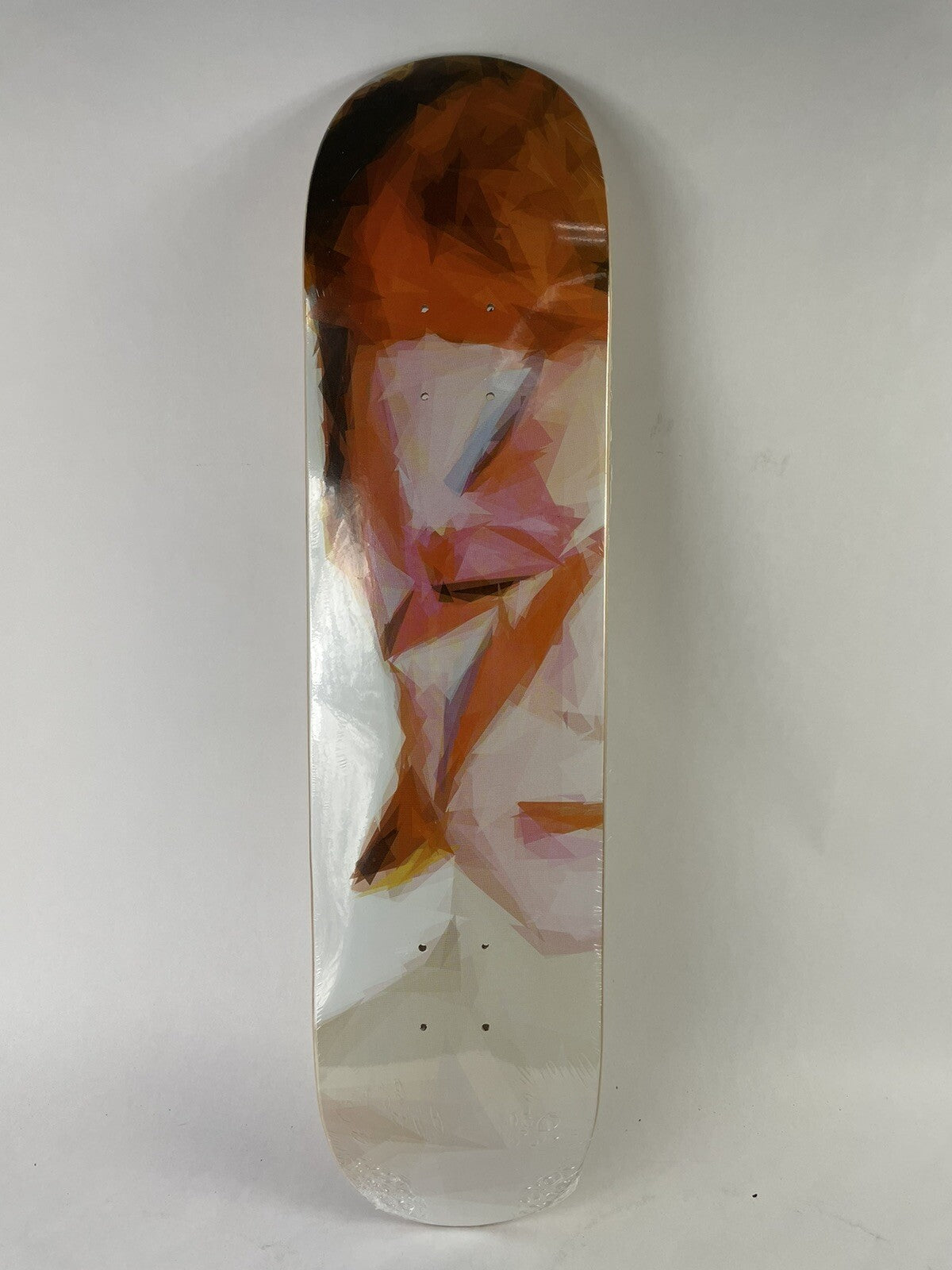 Rare new 7.75-inch David Bowie art skateboard deck with collectible graphic on durable 7-ply maple construction.