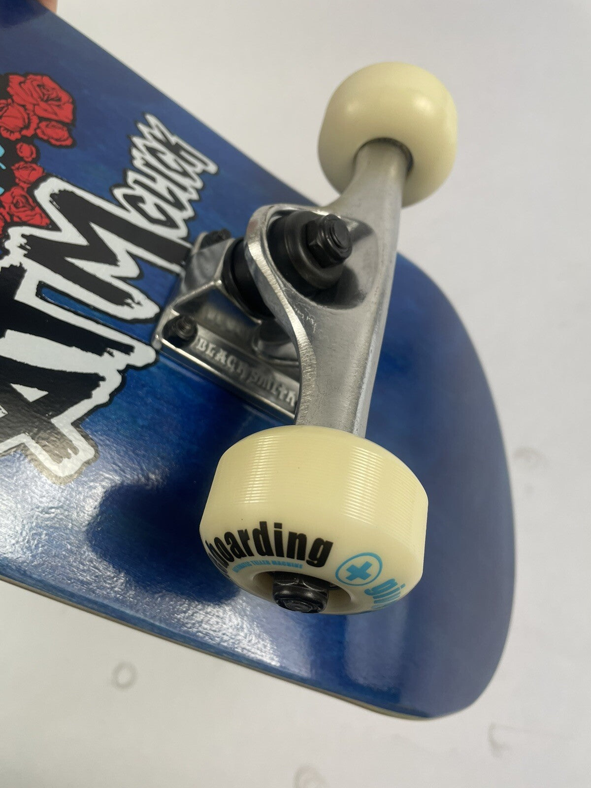 ATM Click Stay Strong 8-inch complete skateboard with Black Smith trucks and 52mm wheels.