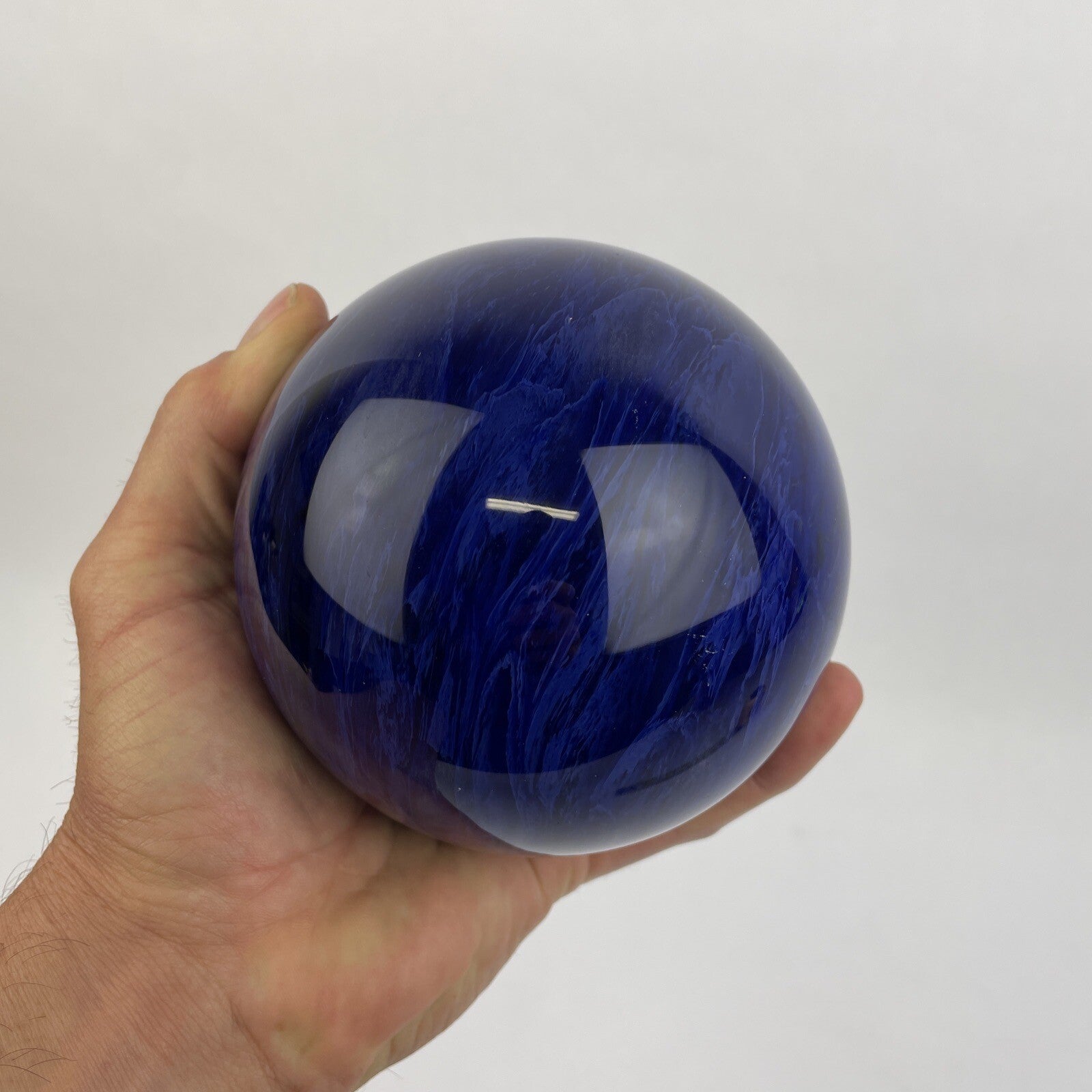 Hand blown cobalt blue crystal art glass paperweight measuring 4 inches and weighing 3.7 lbs.