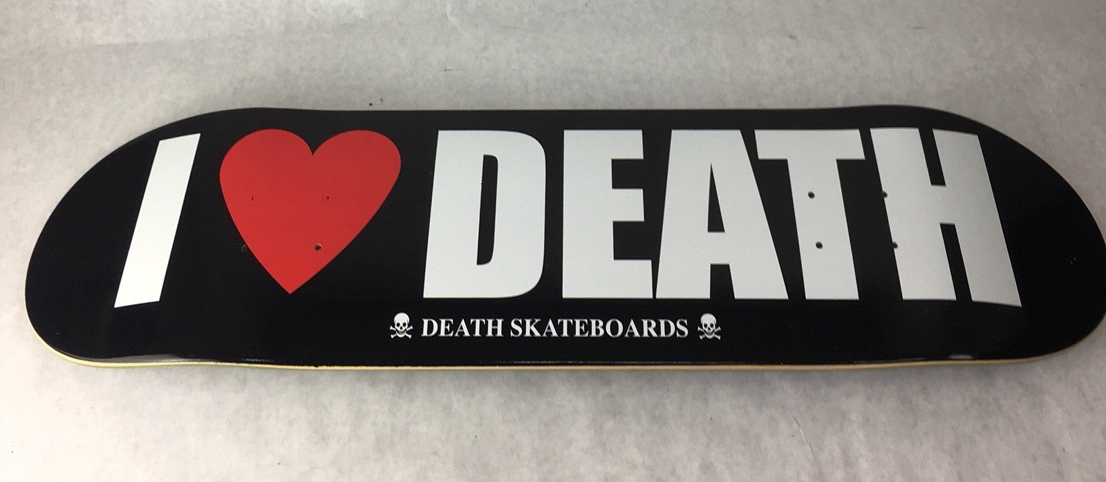 Death Skateboards I Love Death 8.25-inch skateboard deck with grip tape and iconic I Love Death graphic.