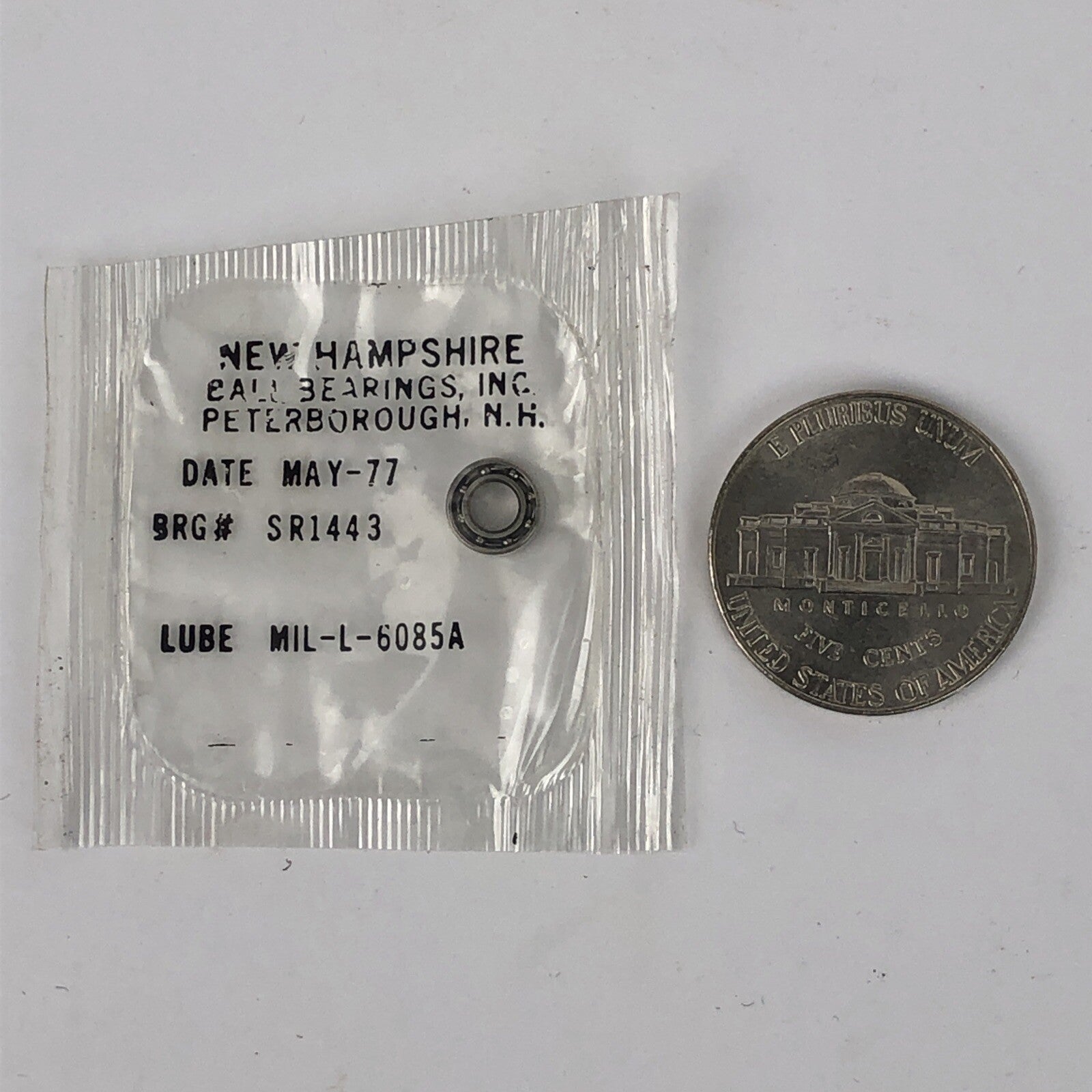 New Hampshire Ball Bearings SR1445 miniature ball bearing NOS lubricated with MIL-L-6085A precision bearing for aerospace and instrument applications.