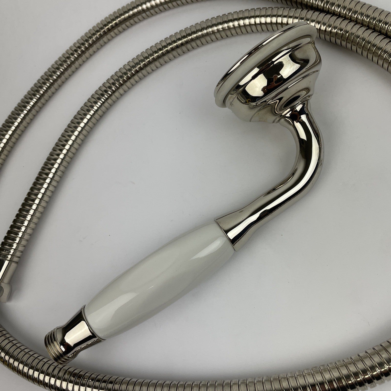 Designer Cooper chrome hand shower with porcelain handle and stainless steel hose