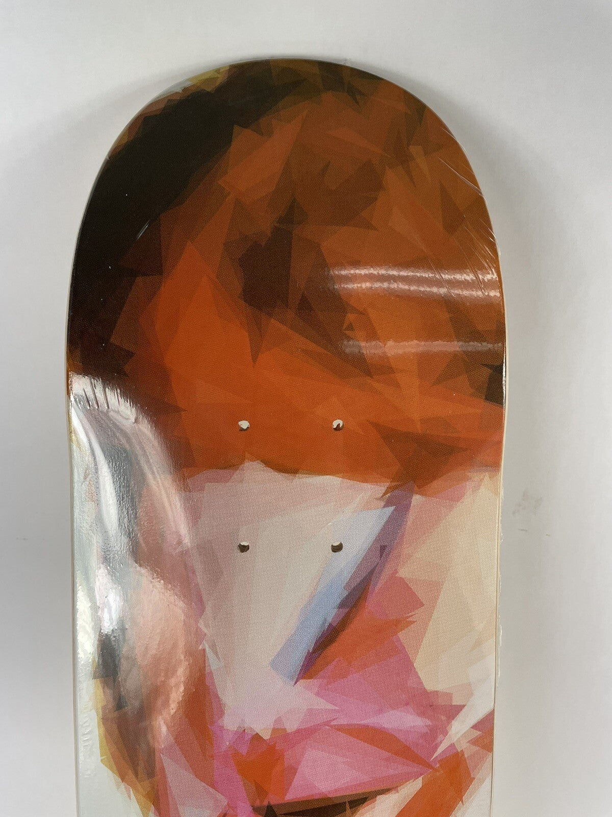 Rare new 7.75-inch David Bowie art skateboard deck with collectible graphic on durable 7-ply maple construction.