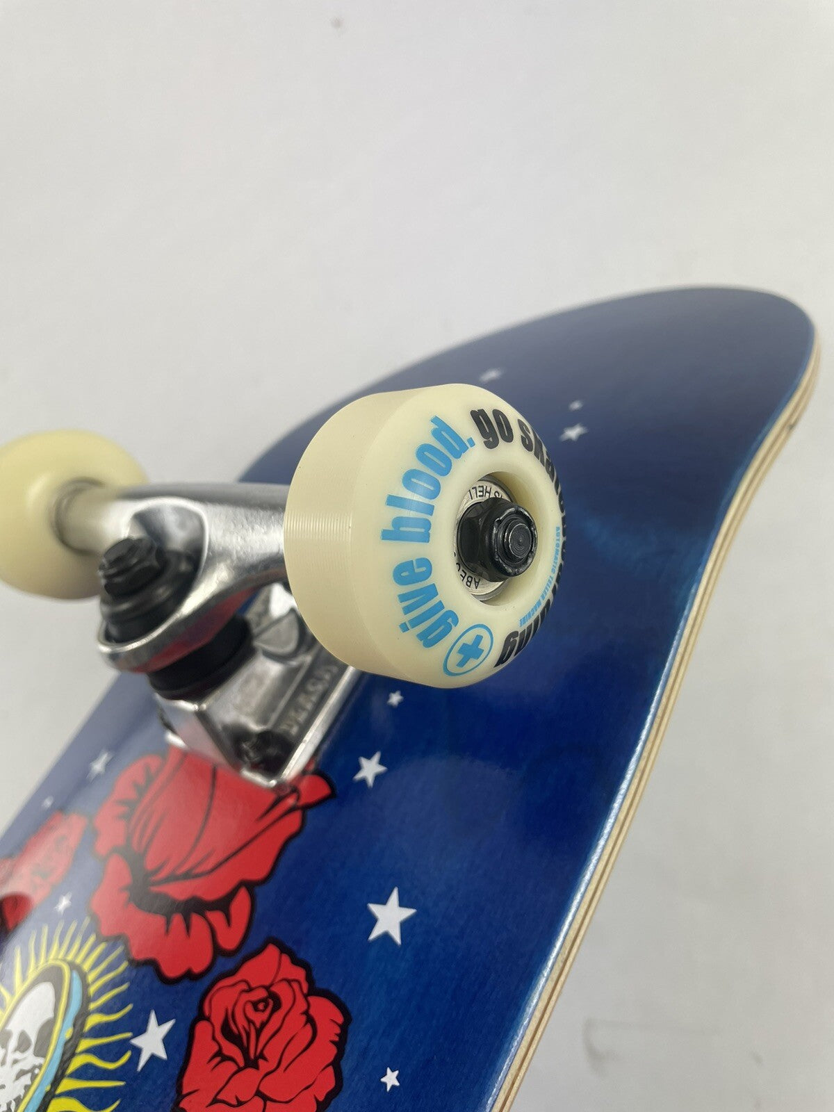 ATM Click Stay Strong 8-inch complete skateboard with Black Smith trucks and 52mm wheels.