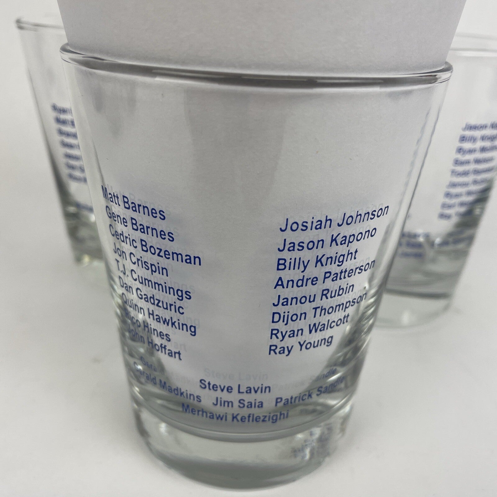 Set of three UCLA Bruins Basketball Awards Banquet highball glasses from 2000, 2001, and 2002.