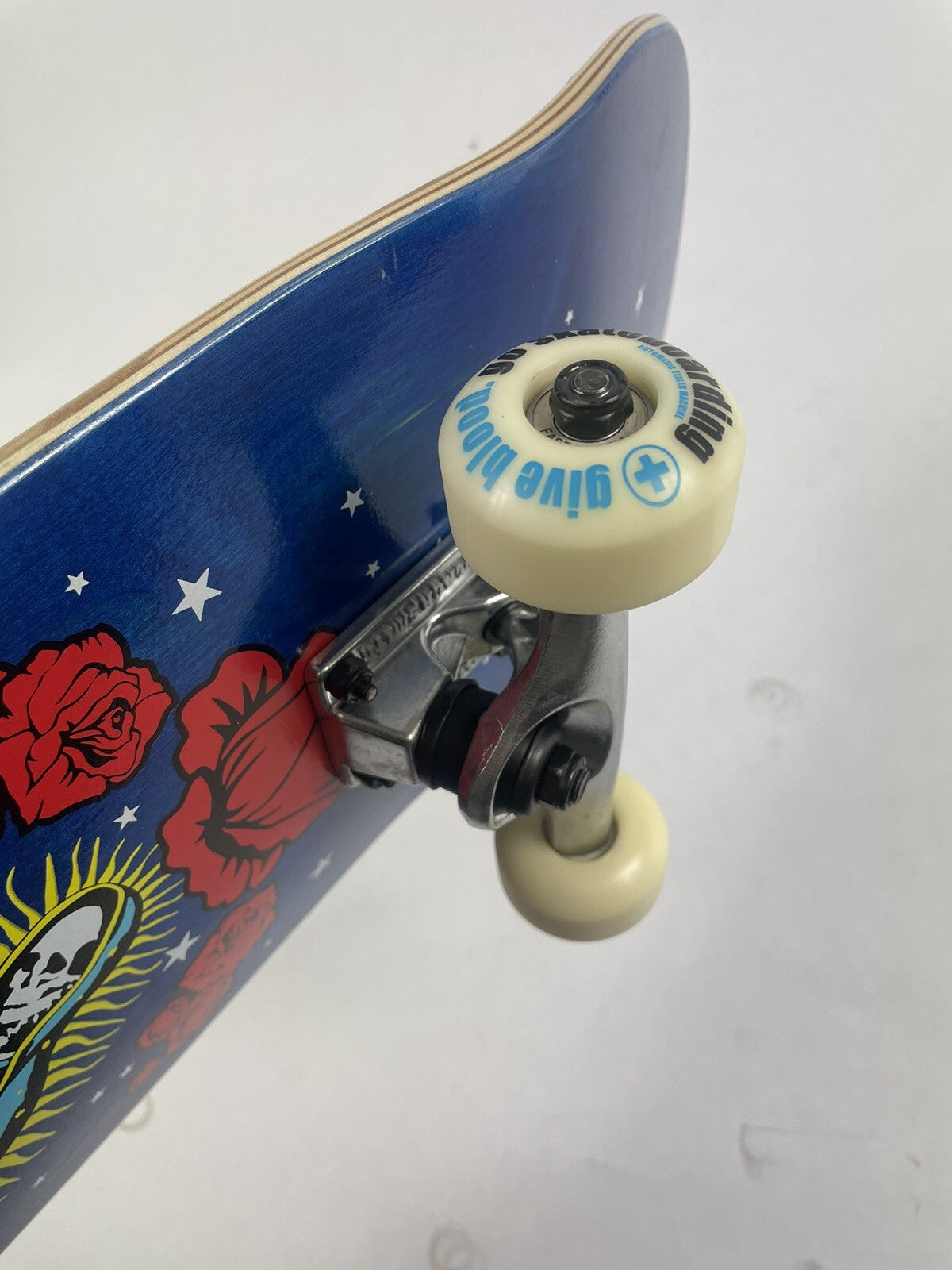 ATM Click Stay Strong 8-inch complete skateboard with Black Smith trucks and 52mm wheels.
