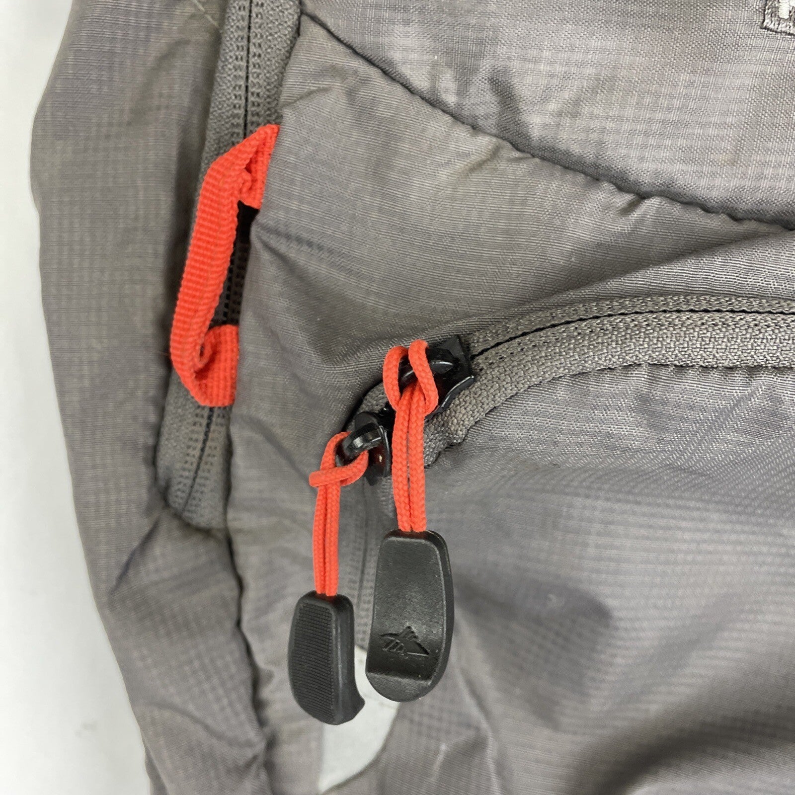 High Sierra Visalia gray hydration backpack with adjustable straps and mesh back panel.