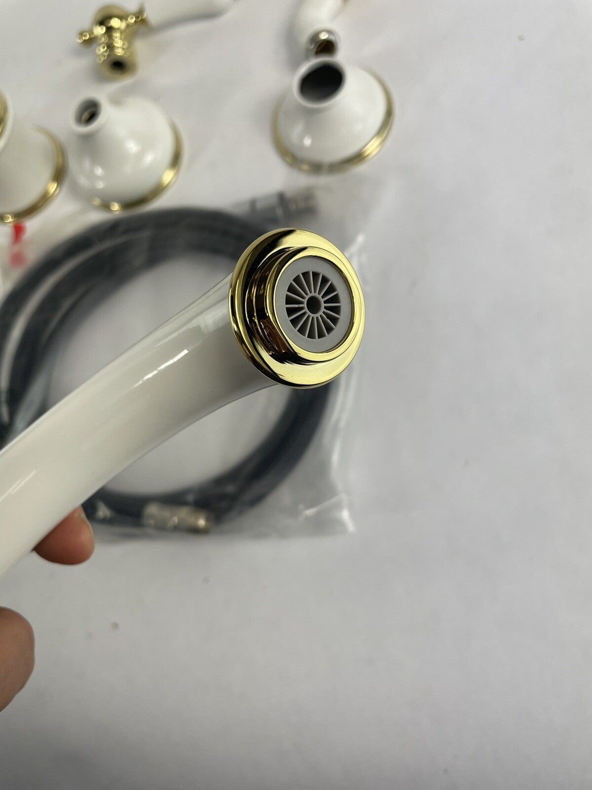 Rubinet Roman tub faucet trim set gold and white with hand shower T5HRBRJLWHBB
