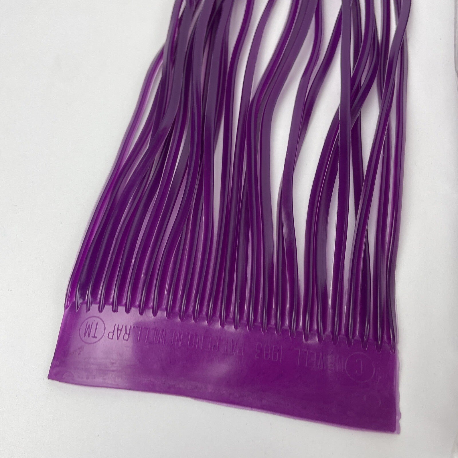 Newell MFG purple offshore trolling fishing skirts 10 pack for tuna and marlin lures.