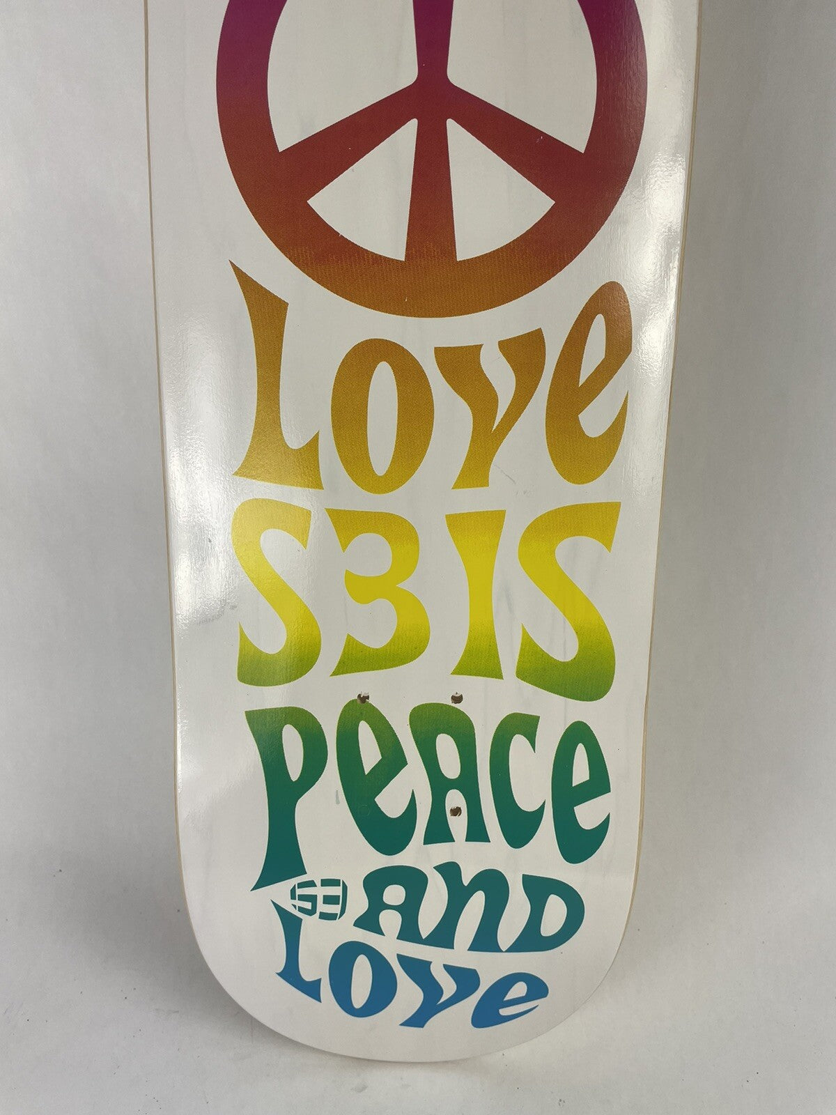 Peace and Love S3 Skateboards 8.5-inch hard rock maple skateboard deck with colorful graphic.
