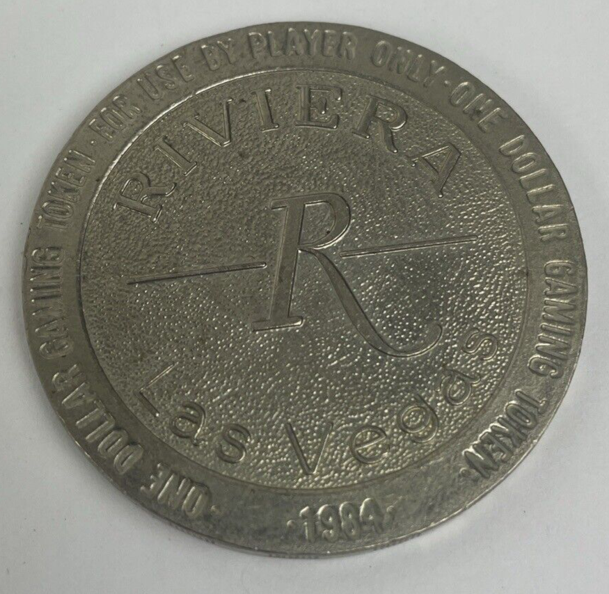RIVIERA HOTEL CASINO 1984 $1 ONE DOLLAR GAMING COIN TOKEN GOLF - Las Vegas, NV