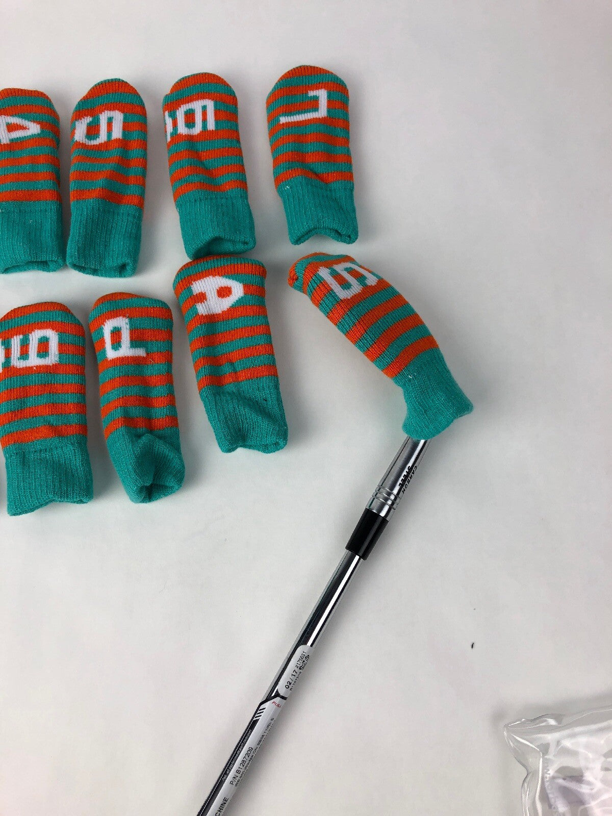 Forbos FBSIC-F 10 piece golf iron head covers teal orange protective set