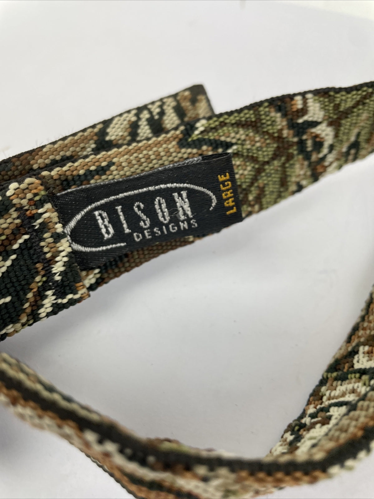 Cabela's Advanced Anglers green waist pack with extras for fly fishing and hiking.