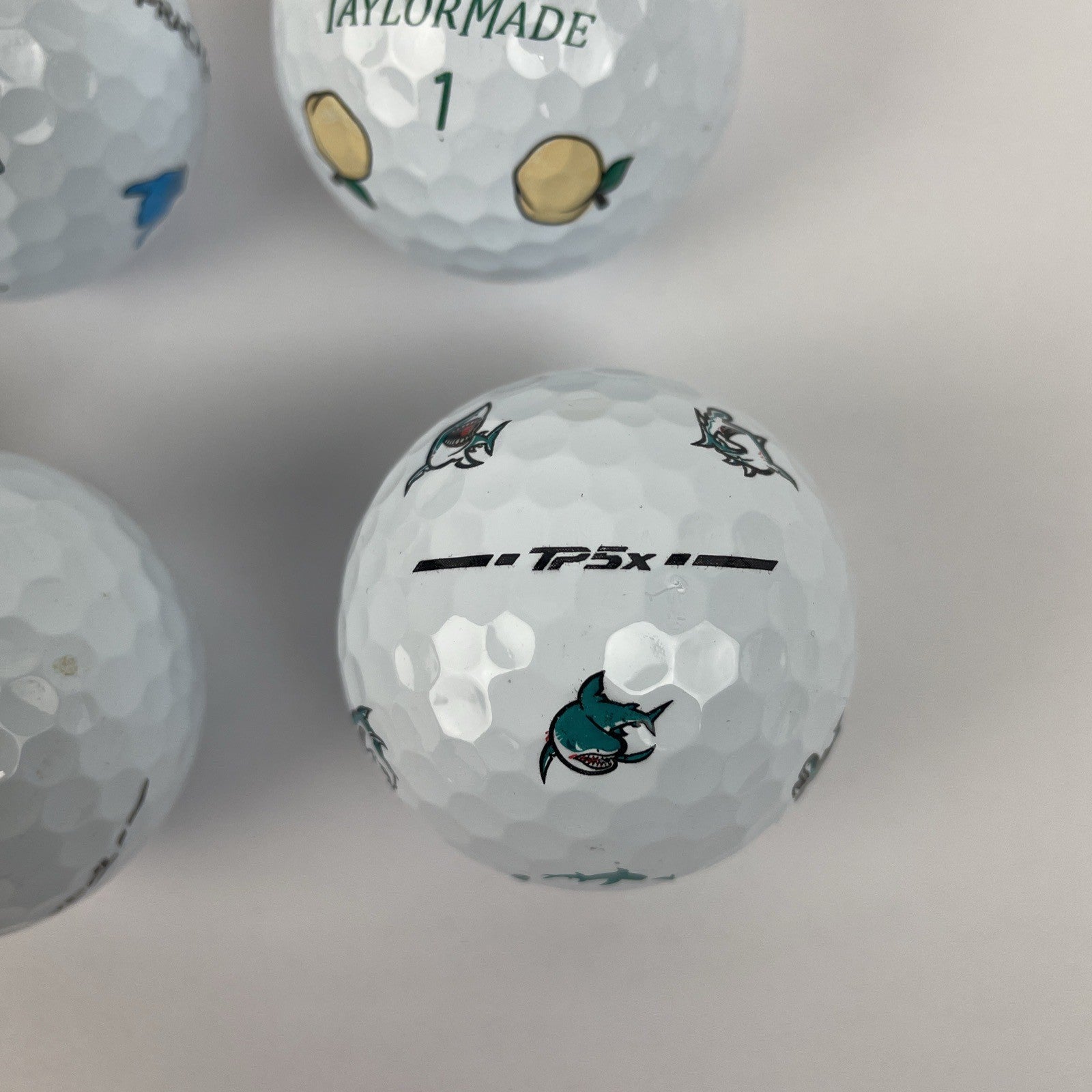 7 Taylormade TP5x Oracle Redbull SHAKA PEACH Bacon And Eggs Palm Shark Golf Ball
