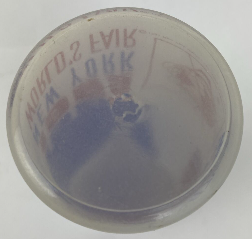 Vintage 1964–1965 New York World's Fair Pool of Industry souvenir glass with red white and blue graphics.