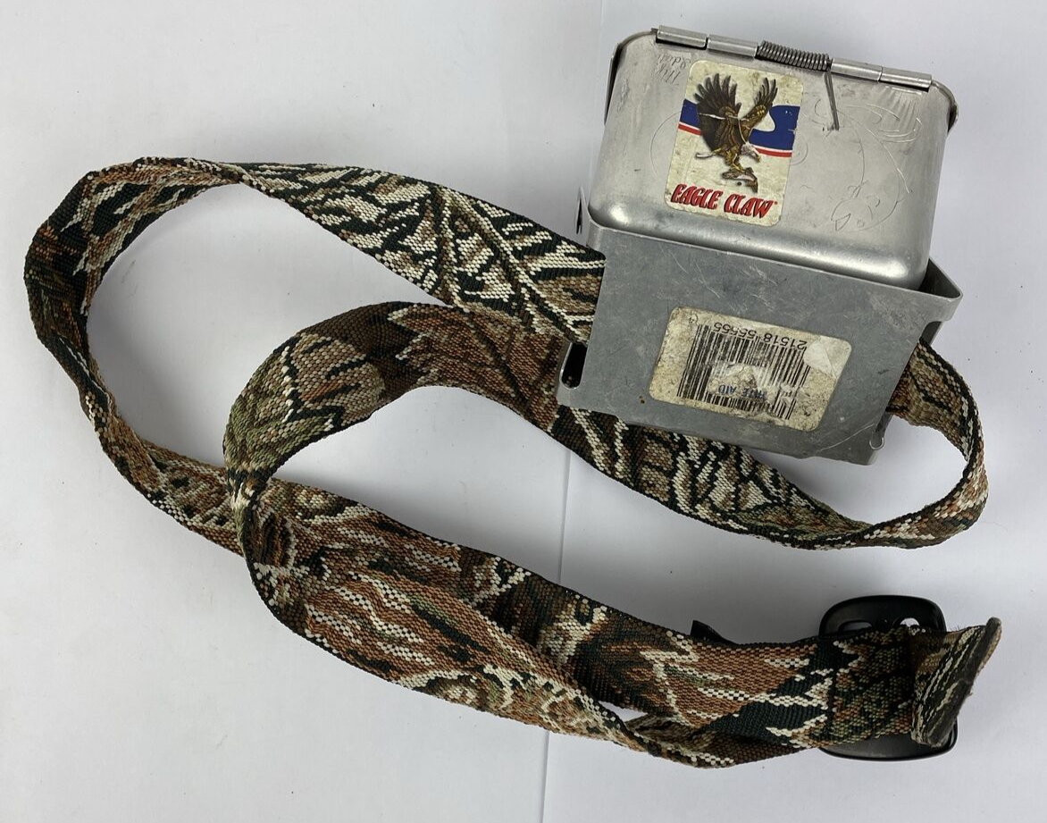 Cabela's Advanced Anglers green waist pack with extras for fly fishing and hiking.