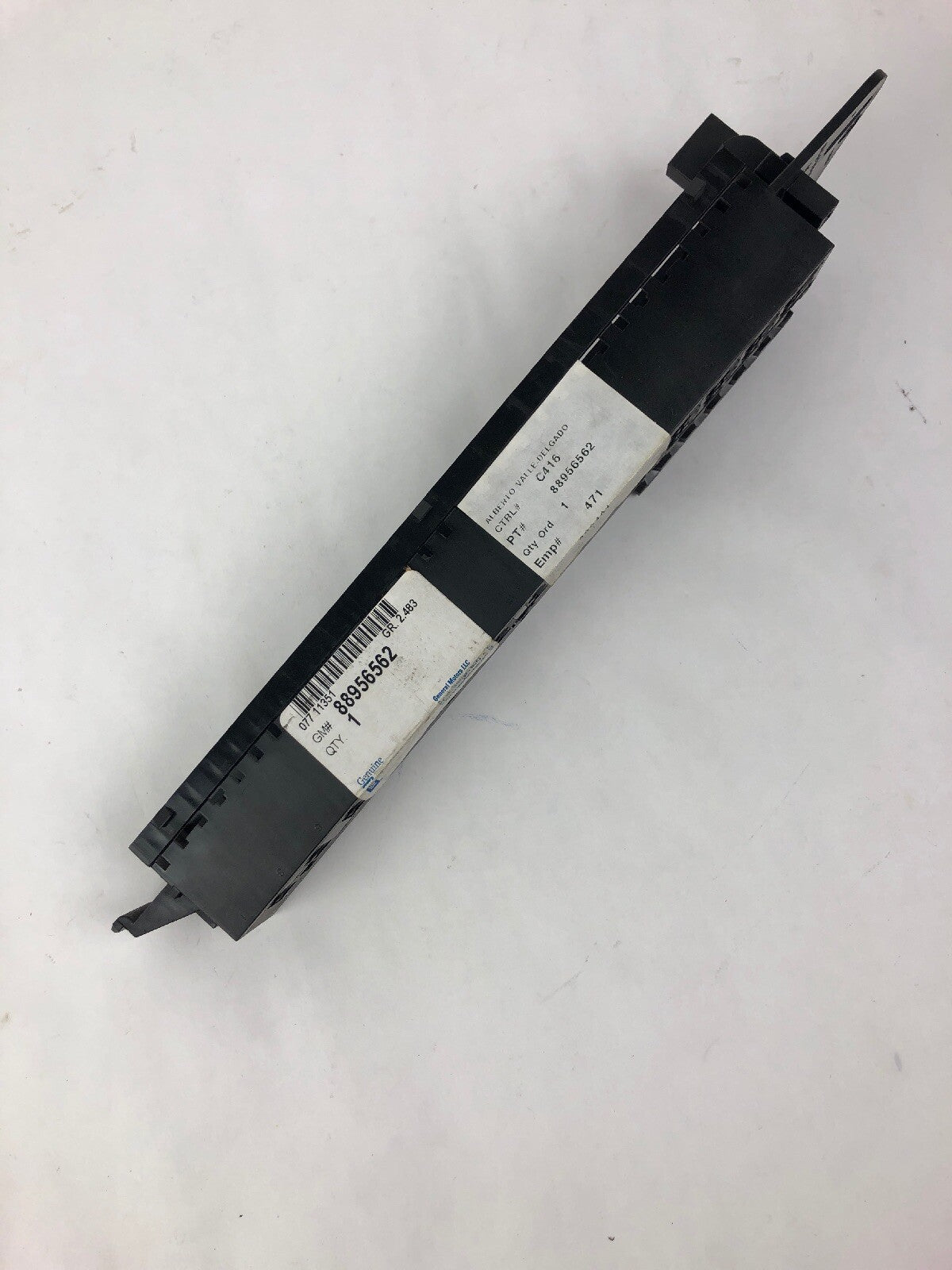 Genuine GM OEM 88956562 engine wiring harness junction fuse block electrical center direct replacement for compatible Chevrolet and Pontiac vehicles.