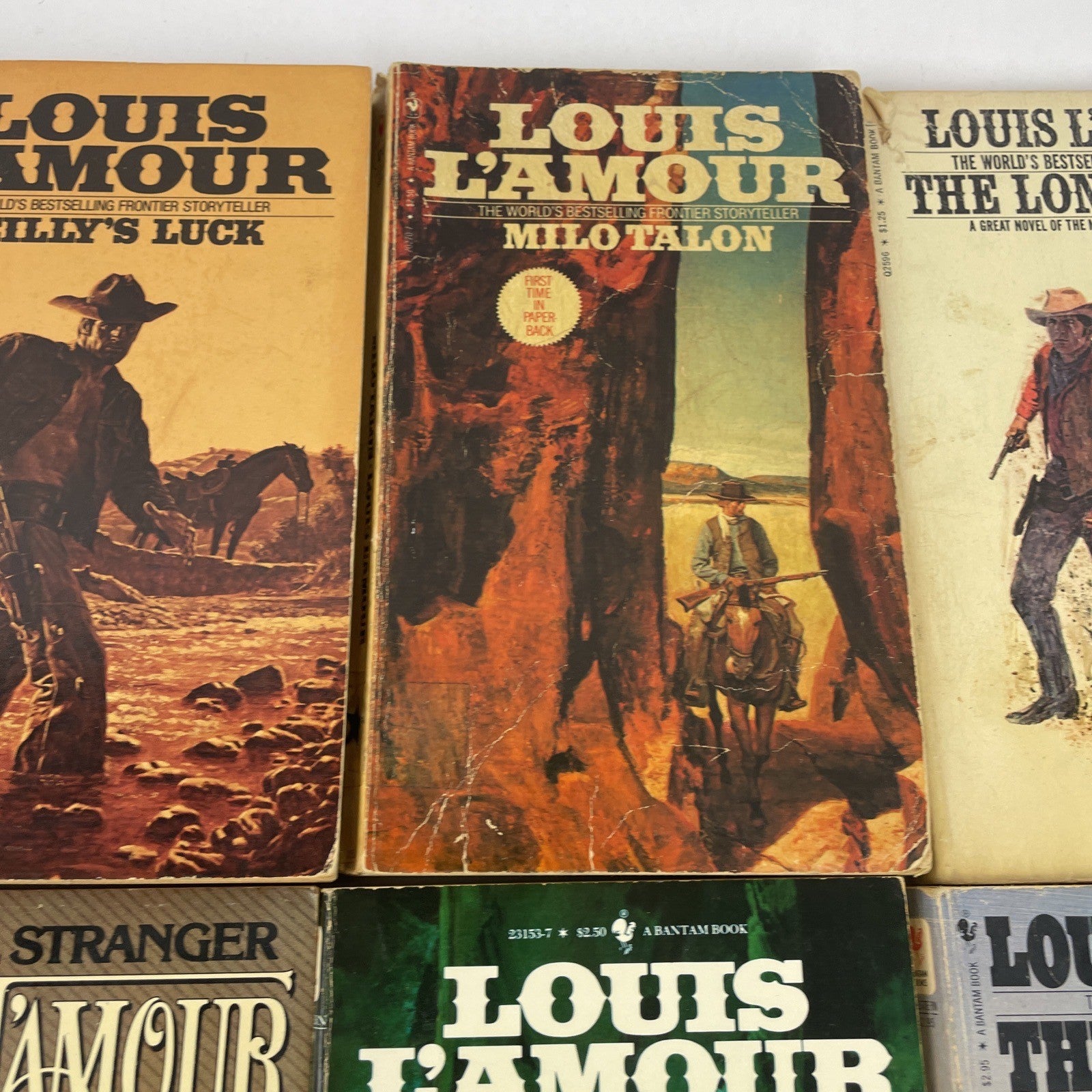 VINTAGE LOT OF 8 LOUIS L'AMOUR WESTERN PAPERBACK BOOKS See Discription