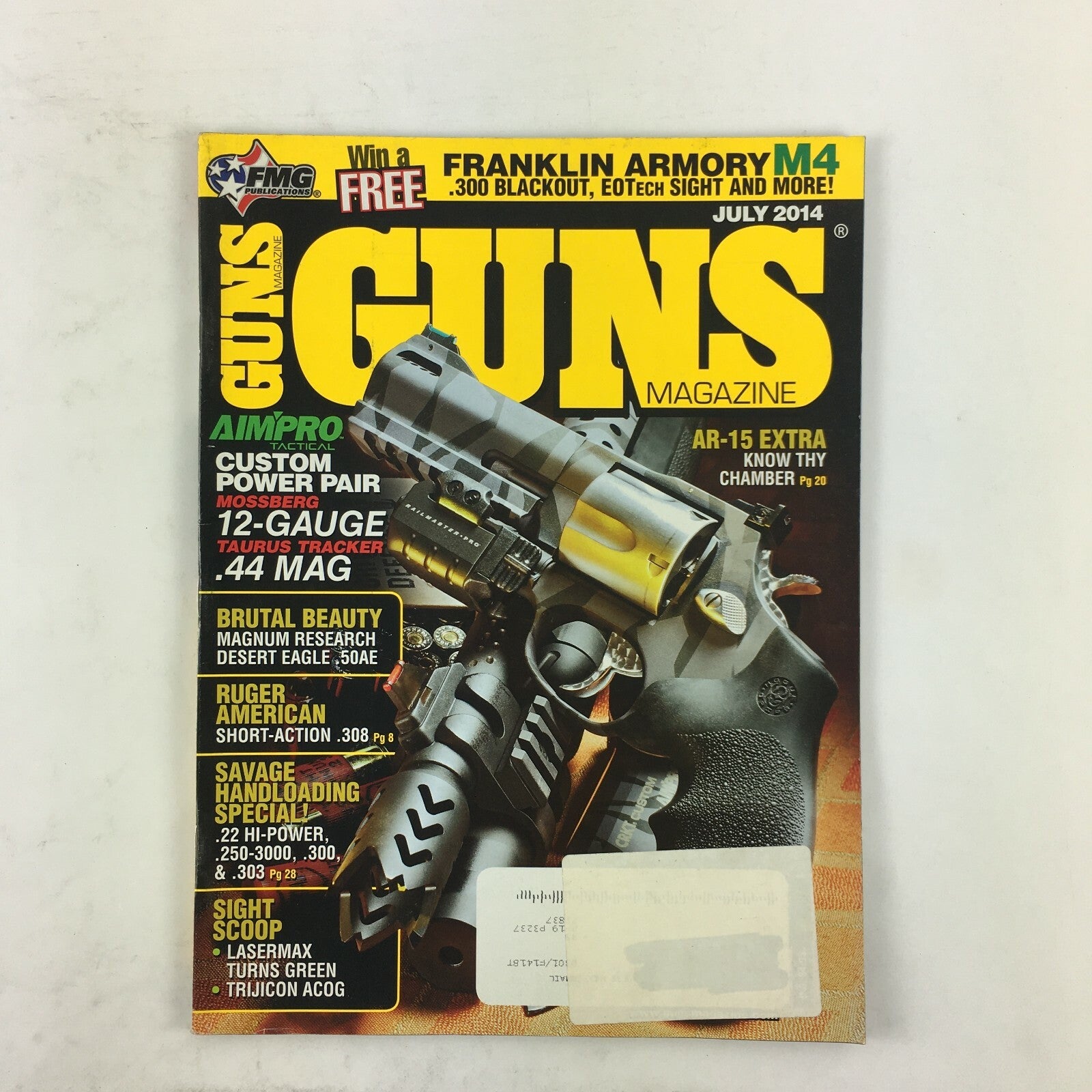July 2014 Guns Magazine Mossberg 12-Gauge Taurus Tracker .44 MAG .22 HI-Power