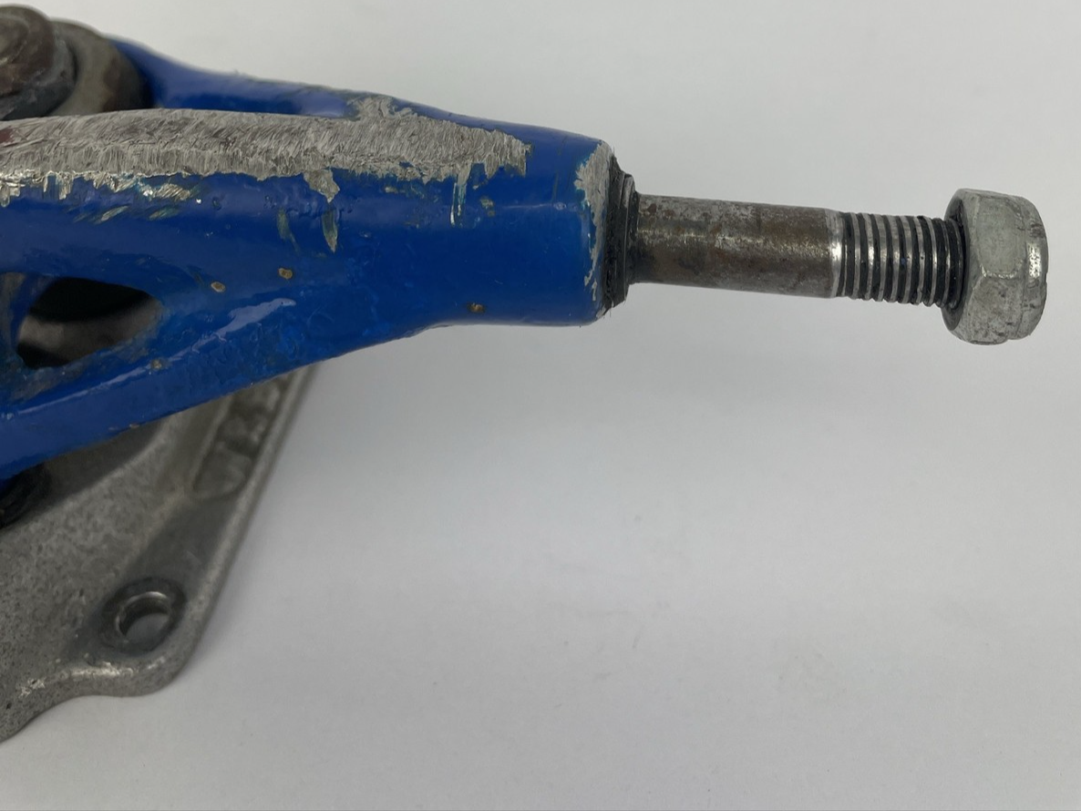 Vintage 1990s Webb Company USA blue single 8-inch skateboard truck.