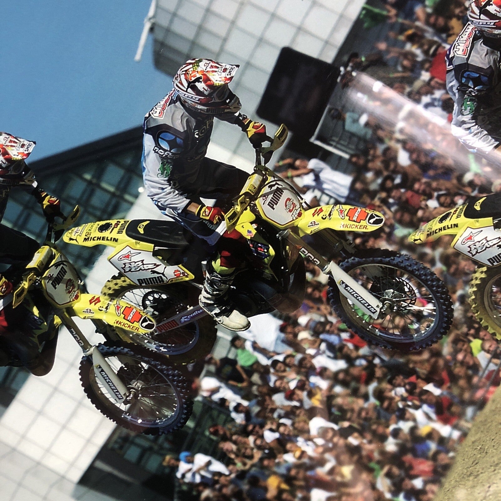 Travis Pastrana signed framed No Fear backflip poster measuring 42.5 by 30.5 inches.