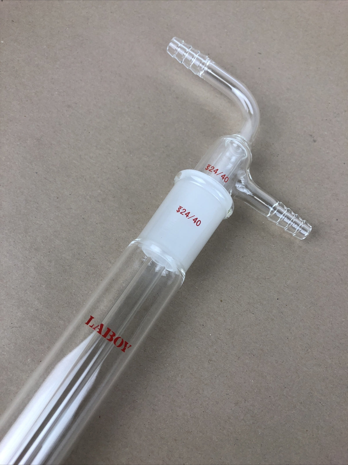 New Laboy borosilicate glass inlet adapter with 24/40 inner glass joint and beaker.