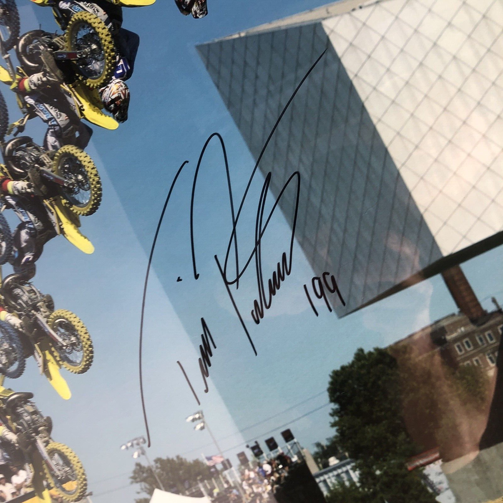 Travis Pastrana signed framed No Fear backflip poster measuring 42.5 by 30.5 inches.