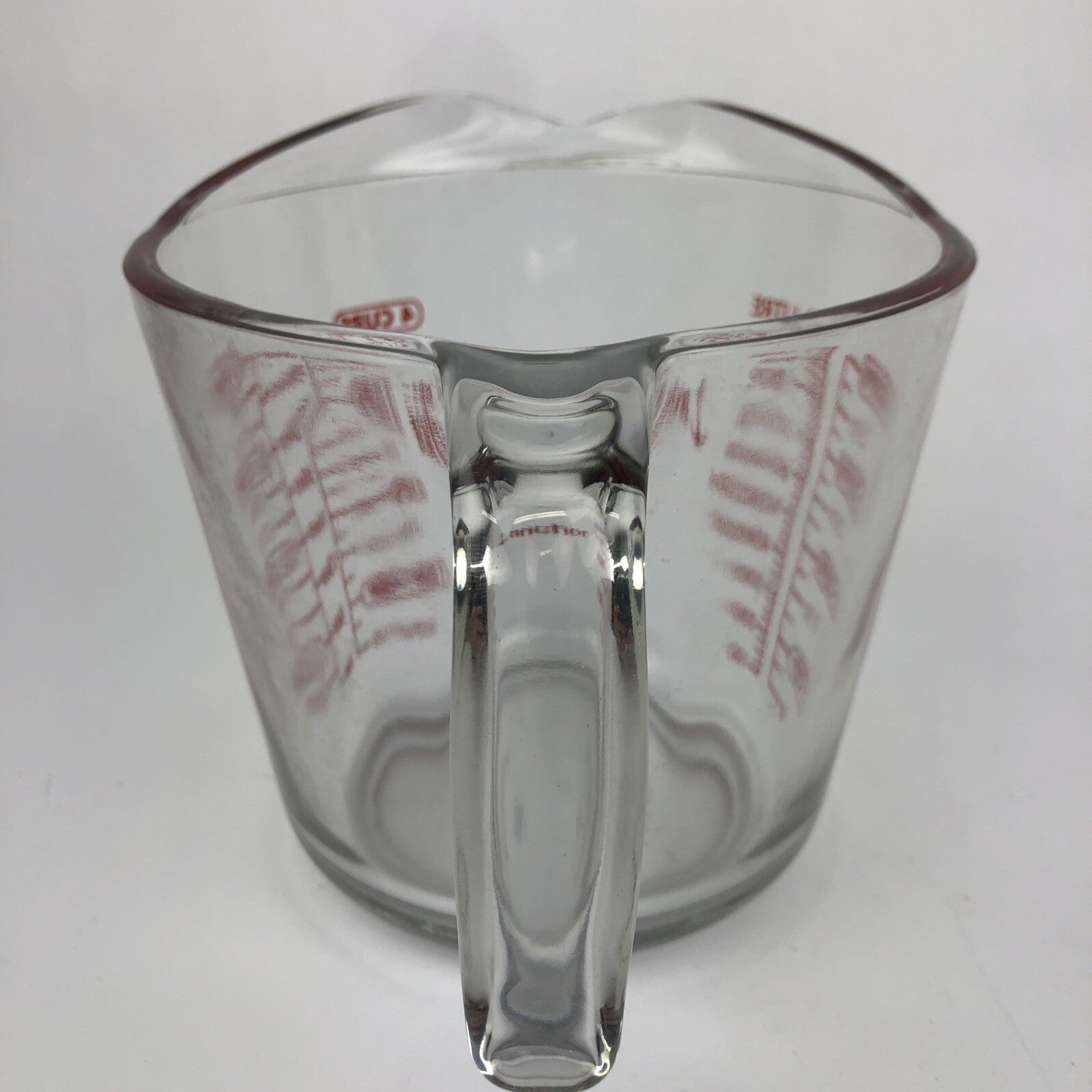 Anchor Hocking USA made 4 cup 1 quart glass measuring cup with red lettering.