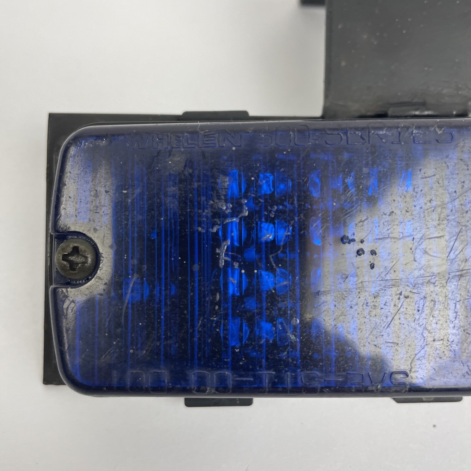 Whelen SmartLED 500 blue warning light with bracket