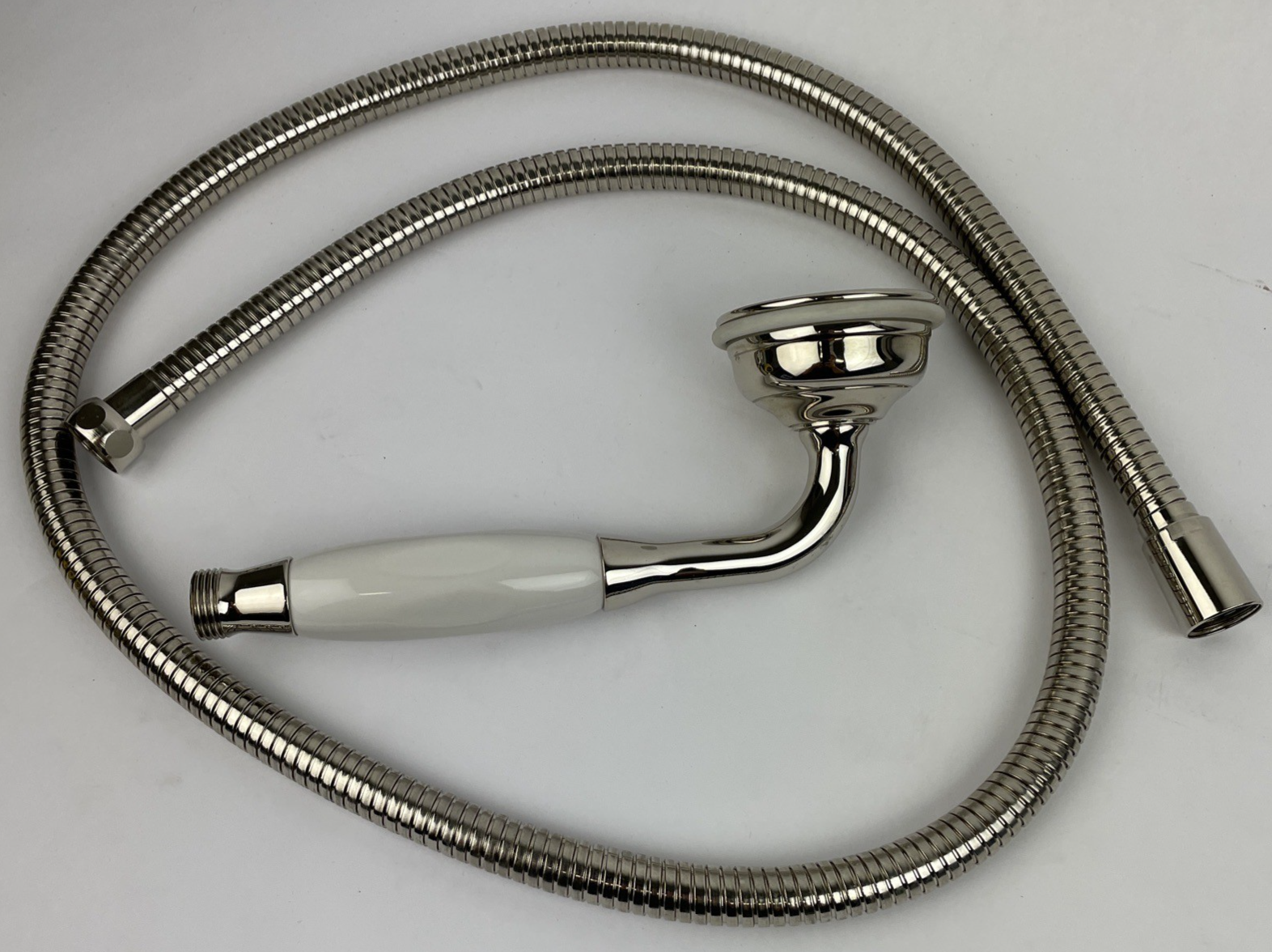 Designer Cooper chrome hand shower with porcelain handle and stainless steel hose