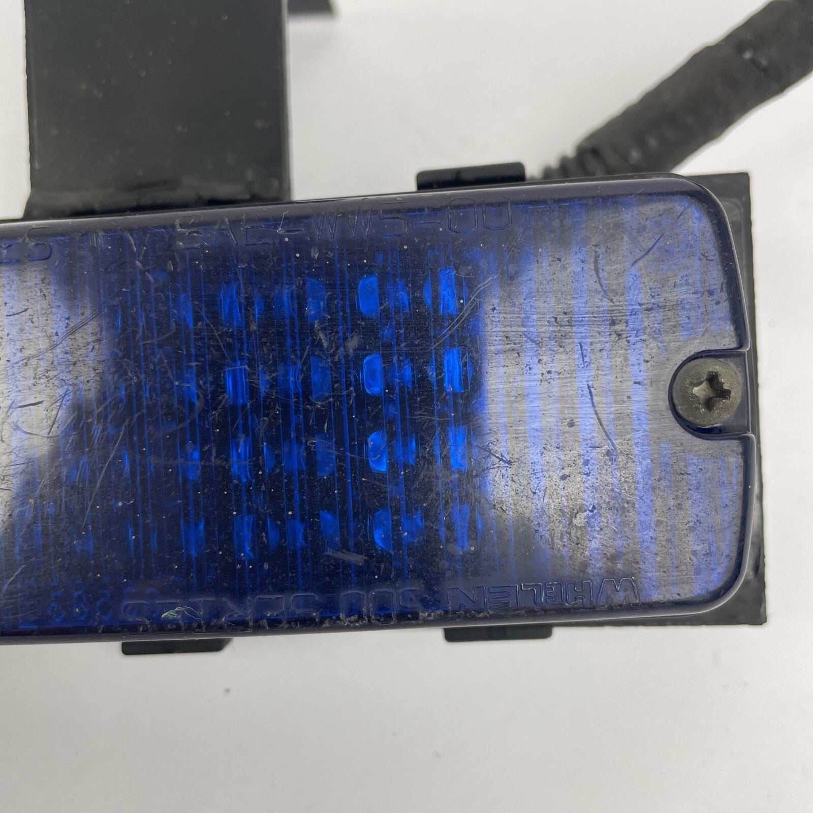Whelen SmartLED 500 blue warning light with bracket