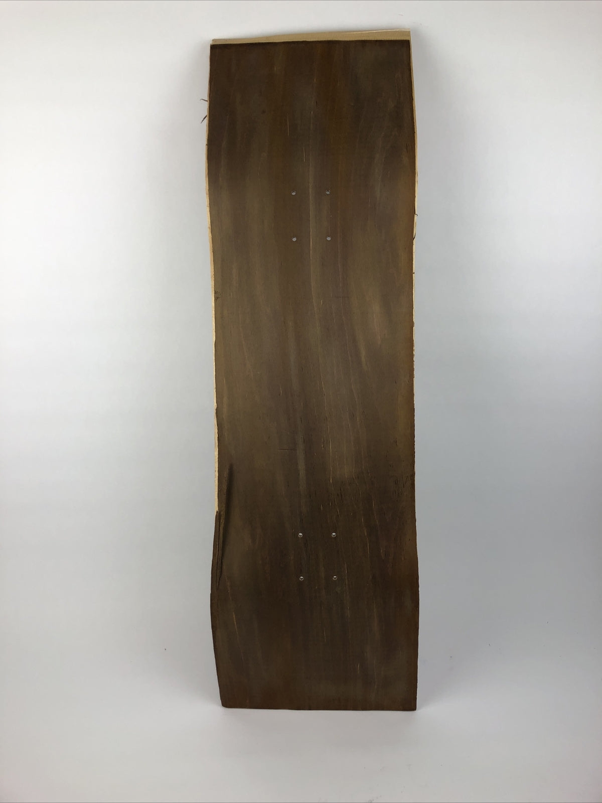 Blank uncut brown stain skateboard deck 10 x 34 inches with 14.25-inch pre-drilled wheelbase.