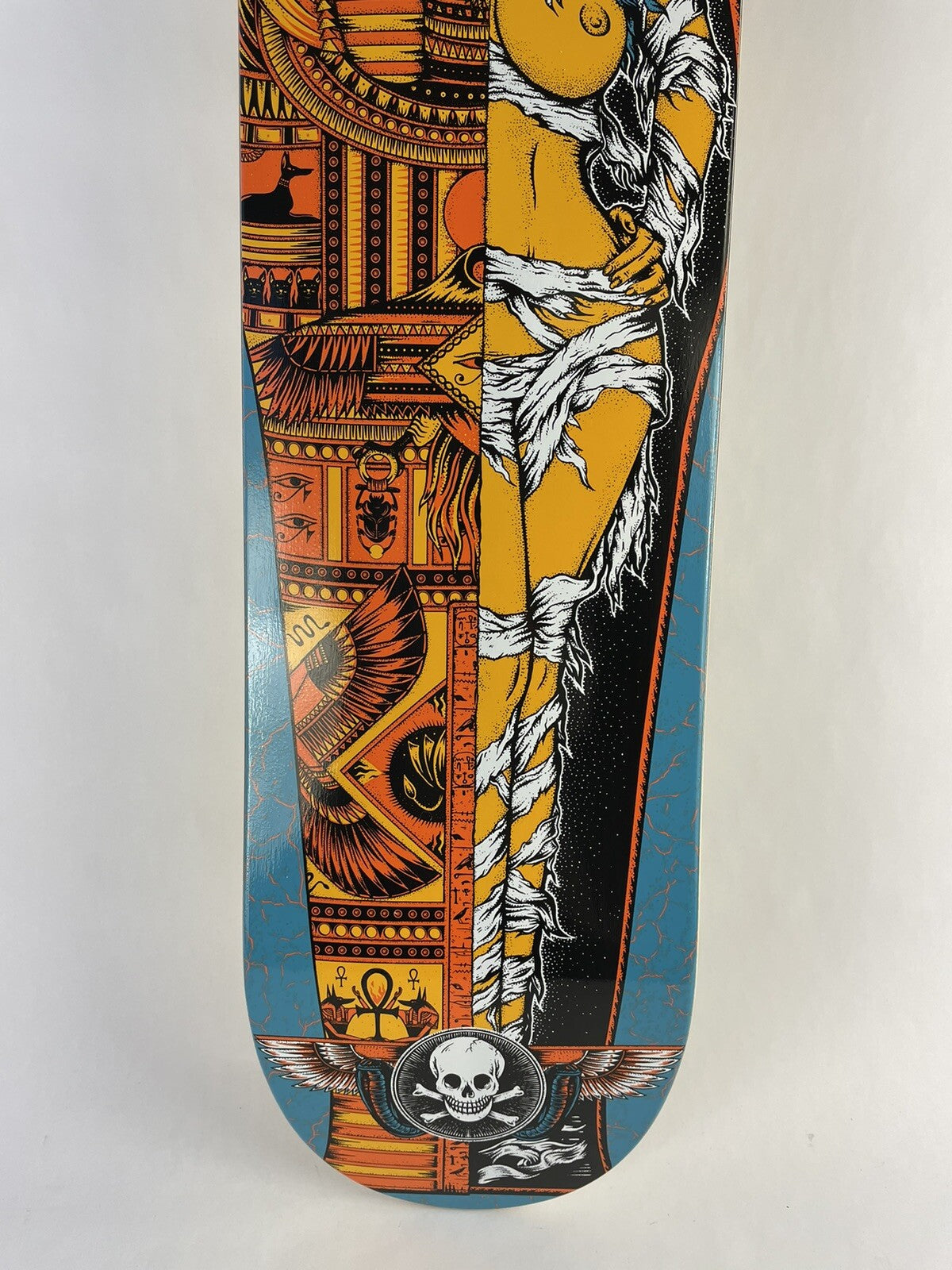 Death Skateboards Dan Cates Blue Mummy Pro 8.25-inch skateboard deck with grip tape and signature graphic.