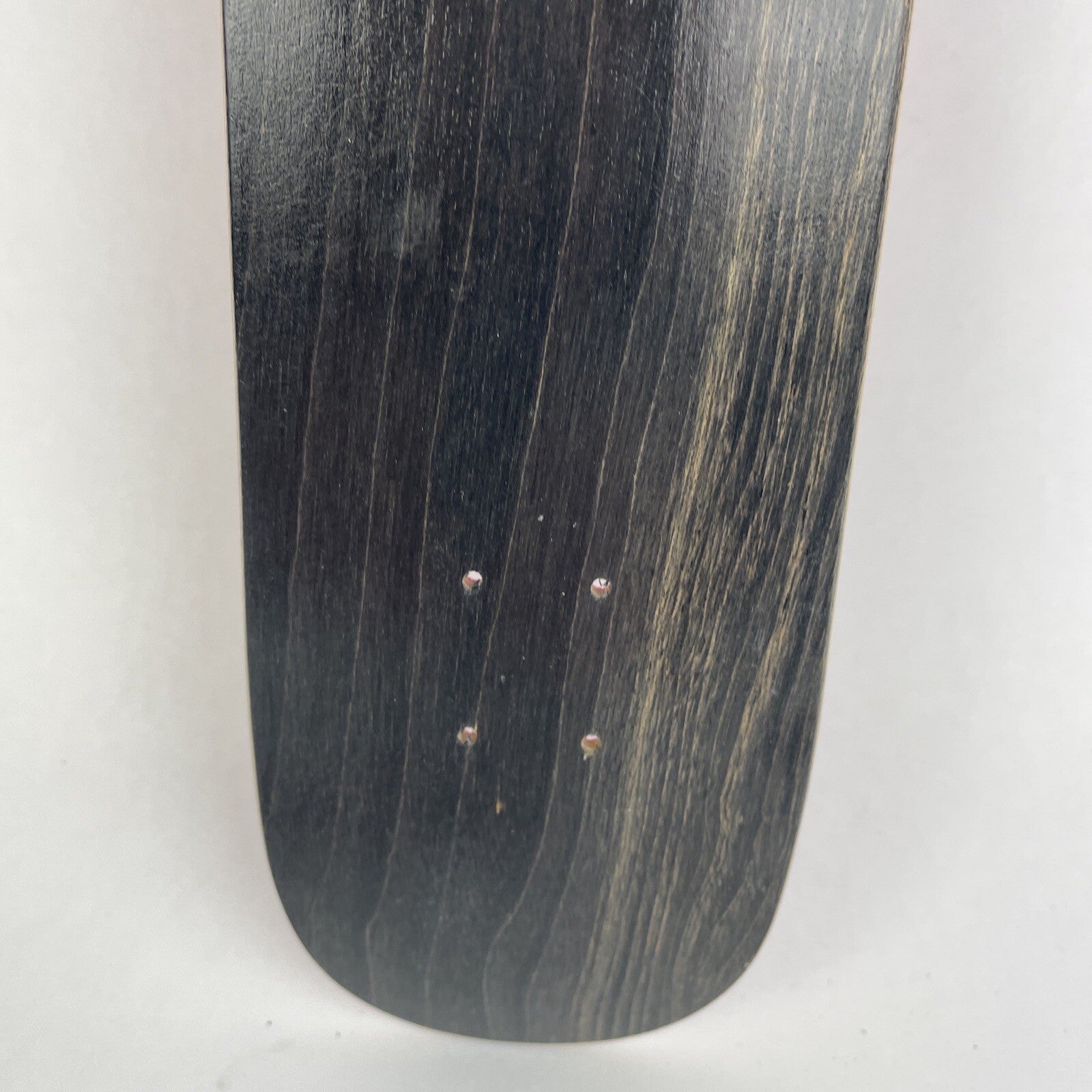 Blank Canadian maple miniature finger skateboard deck measuring 10.5 cm by 2.75 cm with 4.25 cm wheelbase.