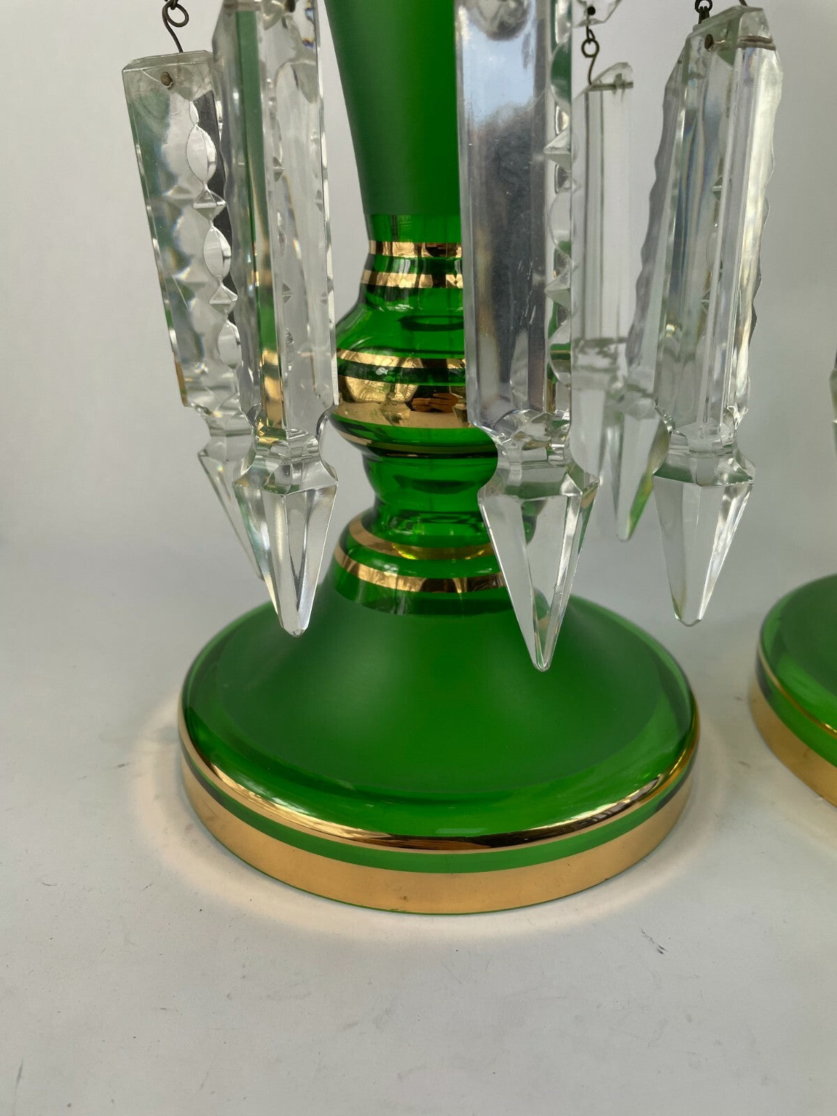 Set of two beautifully designed decorative crafted clear glass display articles.