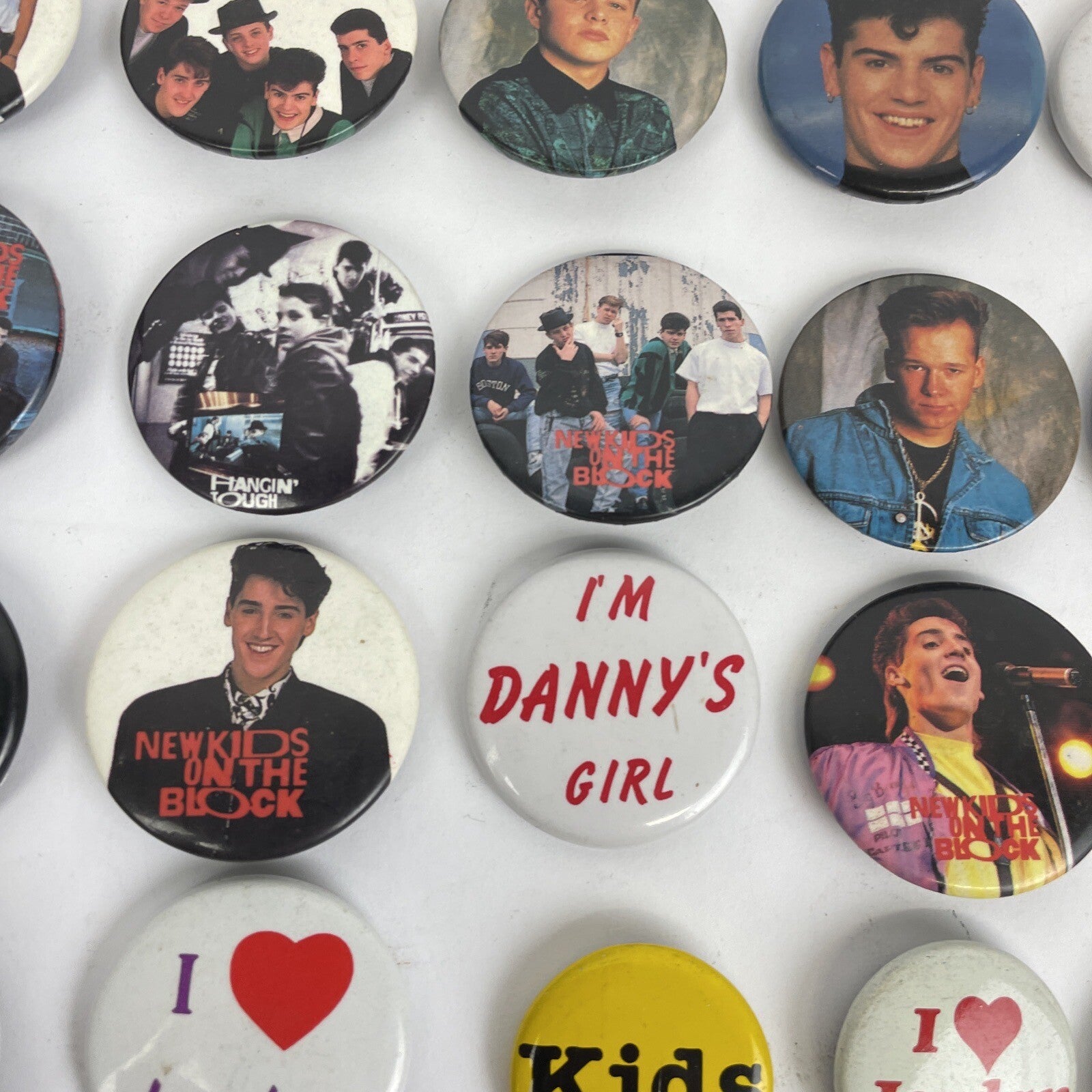Lot of 45 New Kids On The Block buttons pins keychain and vintage NKOTB collectibles from the 90s and Y2K era
