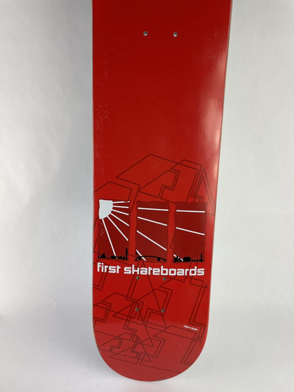 First Skateboard 7.5 x 31-inch graphic skateboard deck made from 7-ply hard rock maple.