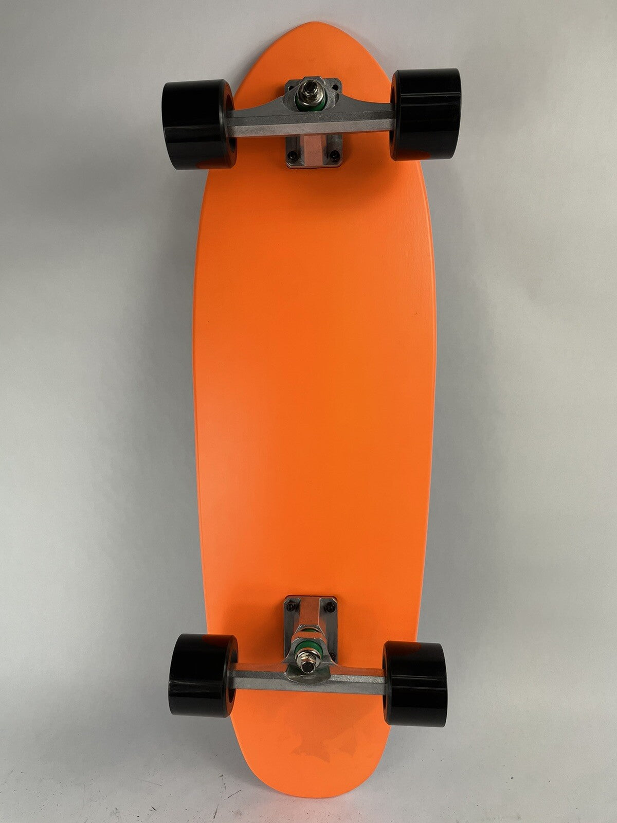 Orange Surf Fish Blank 10-inch complete skateboard with reverse kingpin trucks, 70mm wheels, and ABEC-7 bearings.