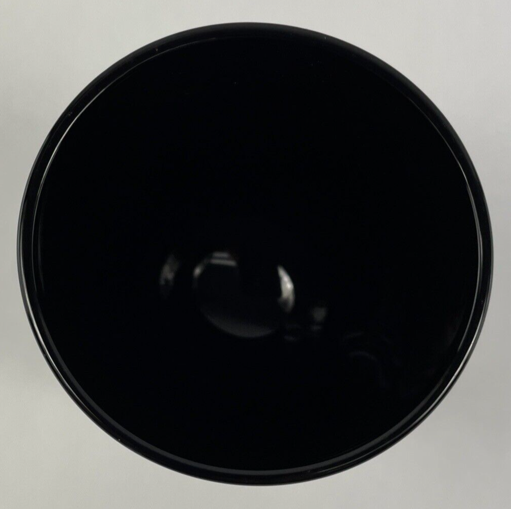 Atlantis Paradise Island black swirl glass souvenir shot glass.