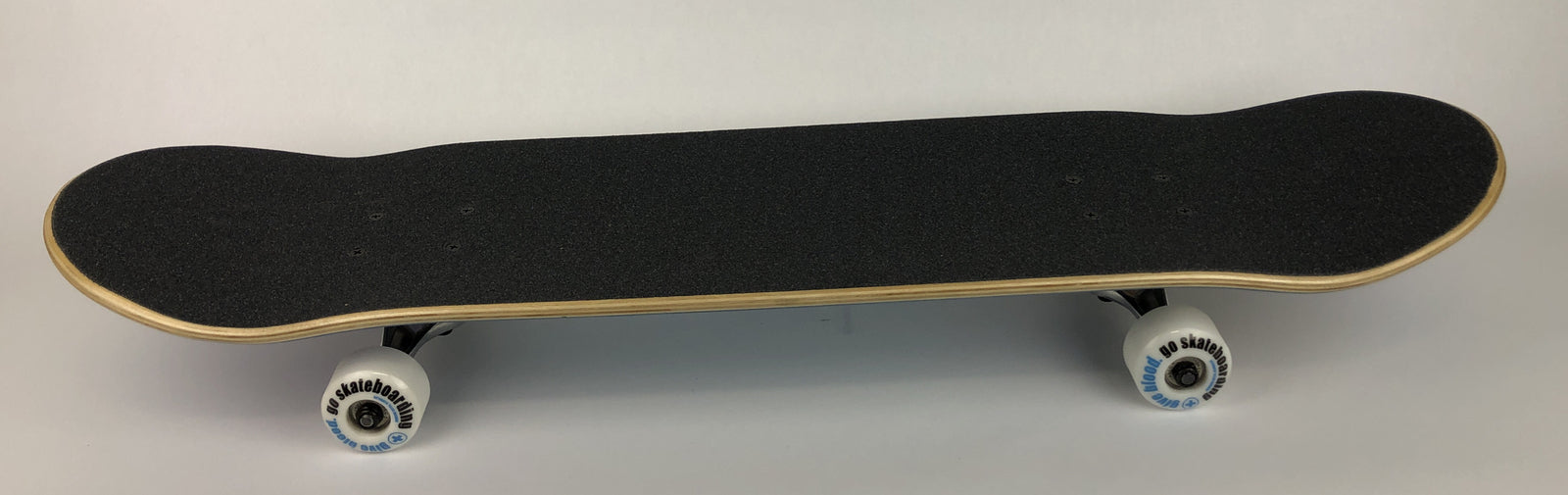 ATM Click Jungle Juice 7.75-inch complete skateboard with Black Smith trucks and 52mm wheels.