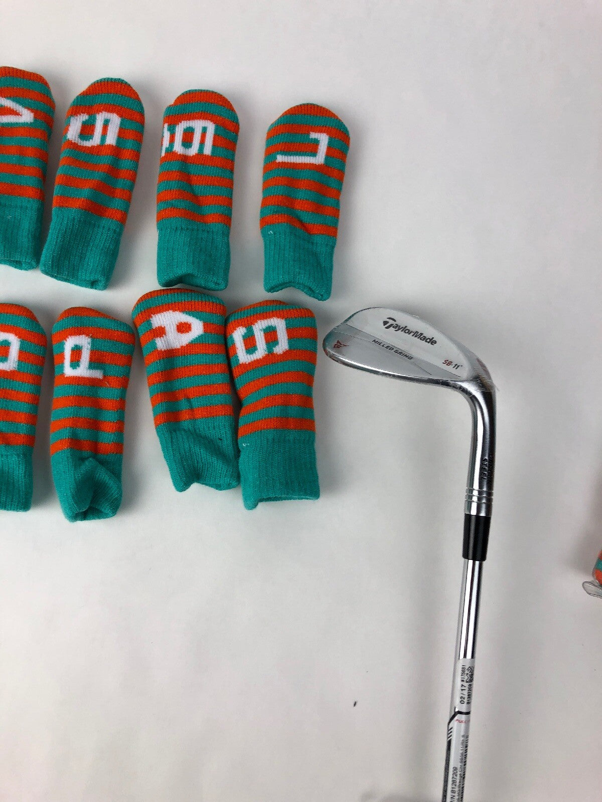 Forbos FBSIC-F 10 piece golf iron head covers teal orange protective set
